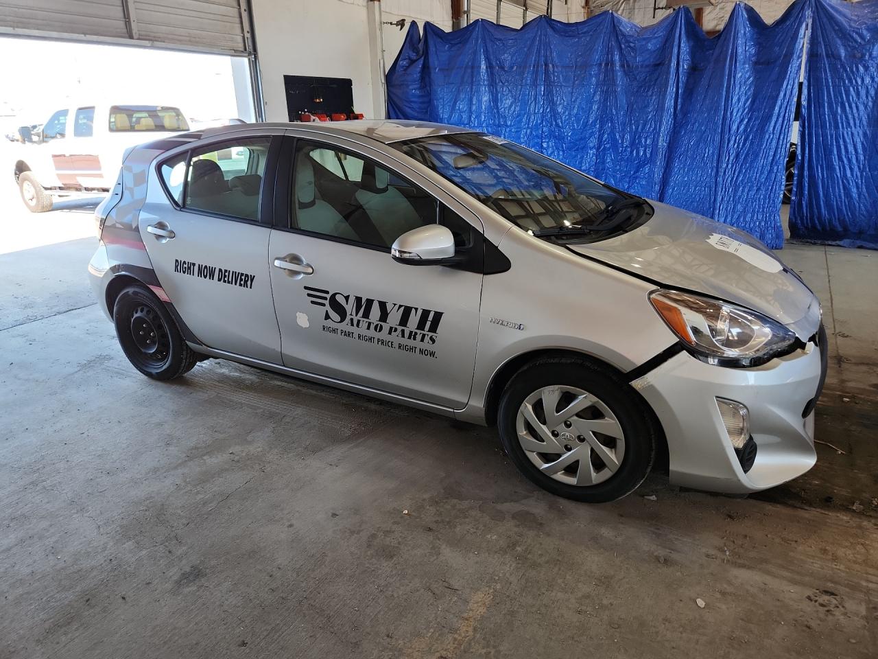 2015 Toyota Prius C One Silver vin: JTDKDTB34F1105357 Damage: Right Rear Wheel Cover, Missing, Replacement Required