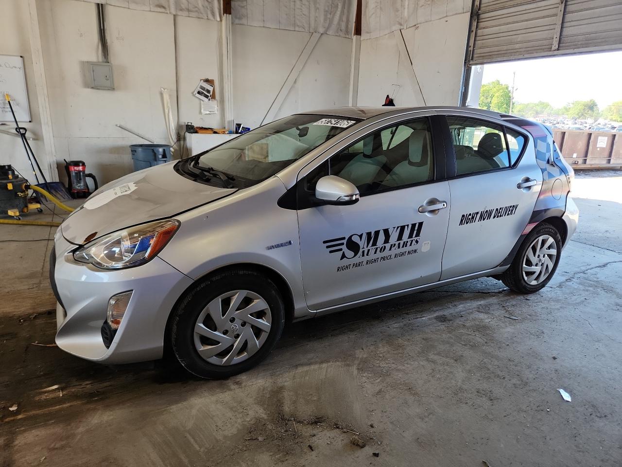 2015 Toyota Prius C One Silver vin: JTDKDTB34F1105357 Damage: Left Front Fender, Heavy Scratch, 1 To 2 Inches