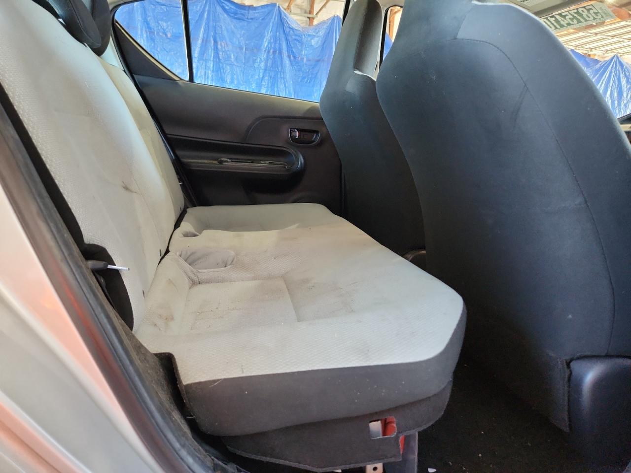 2015 Toyota Prius C One Silver vin: JTDKDTB34F1105357 Damage: Left Rear Seat, Stained, Permanent