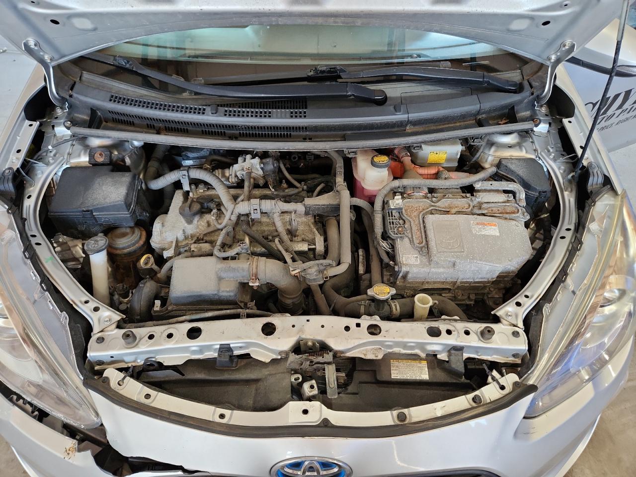 2015 Toyota Prius C One Silver vin: JTDKDTB34F1105357 Damage: Core Support, Kinked, 4 To 5 Inches
