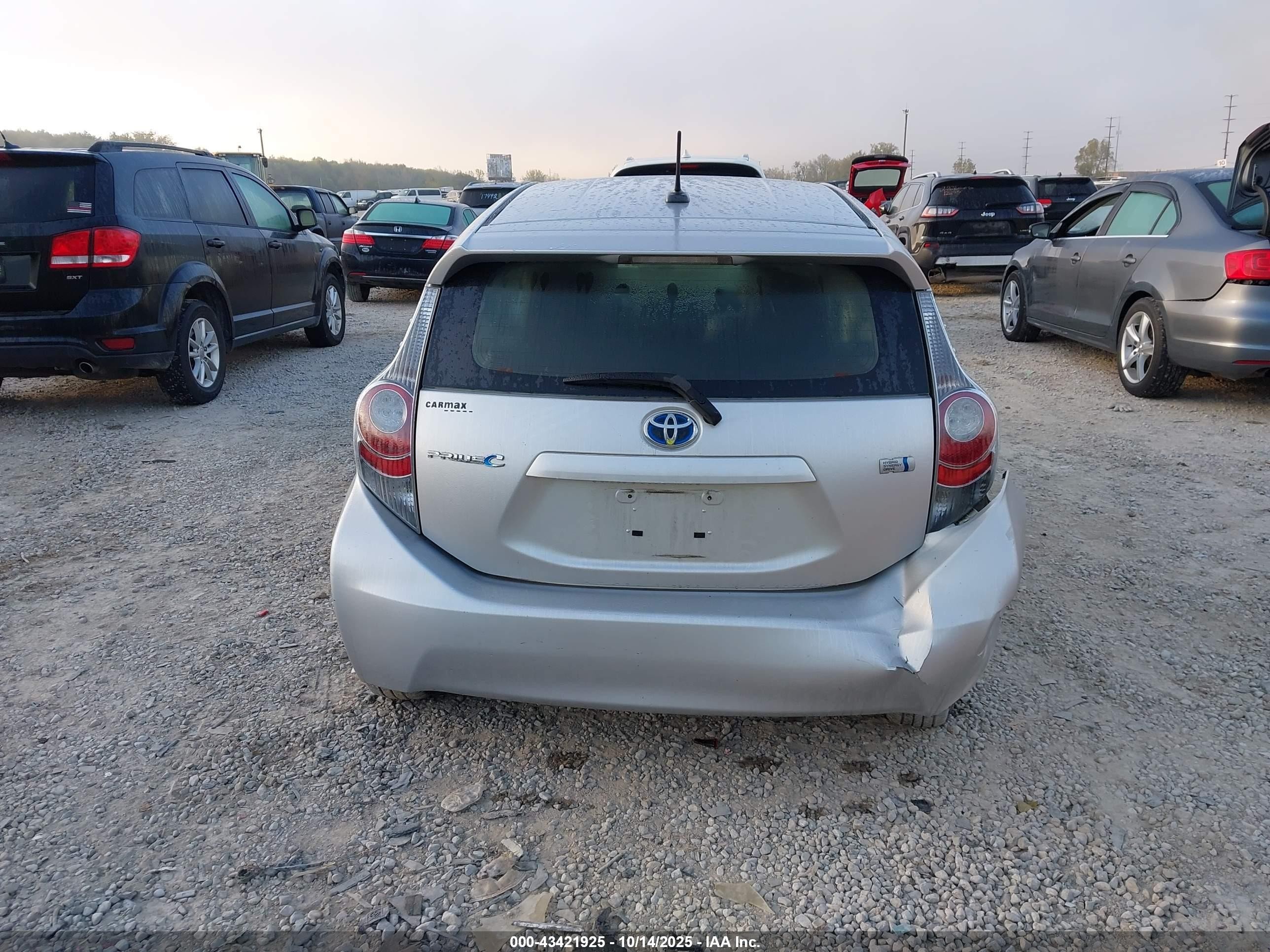 2013 Toyota Prius C Four Серебряный vin: JTDKDTB35D1036319