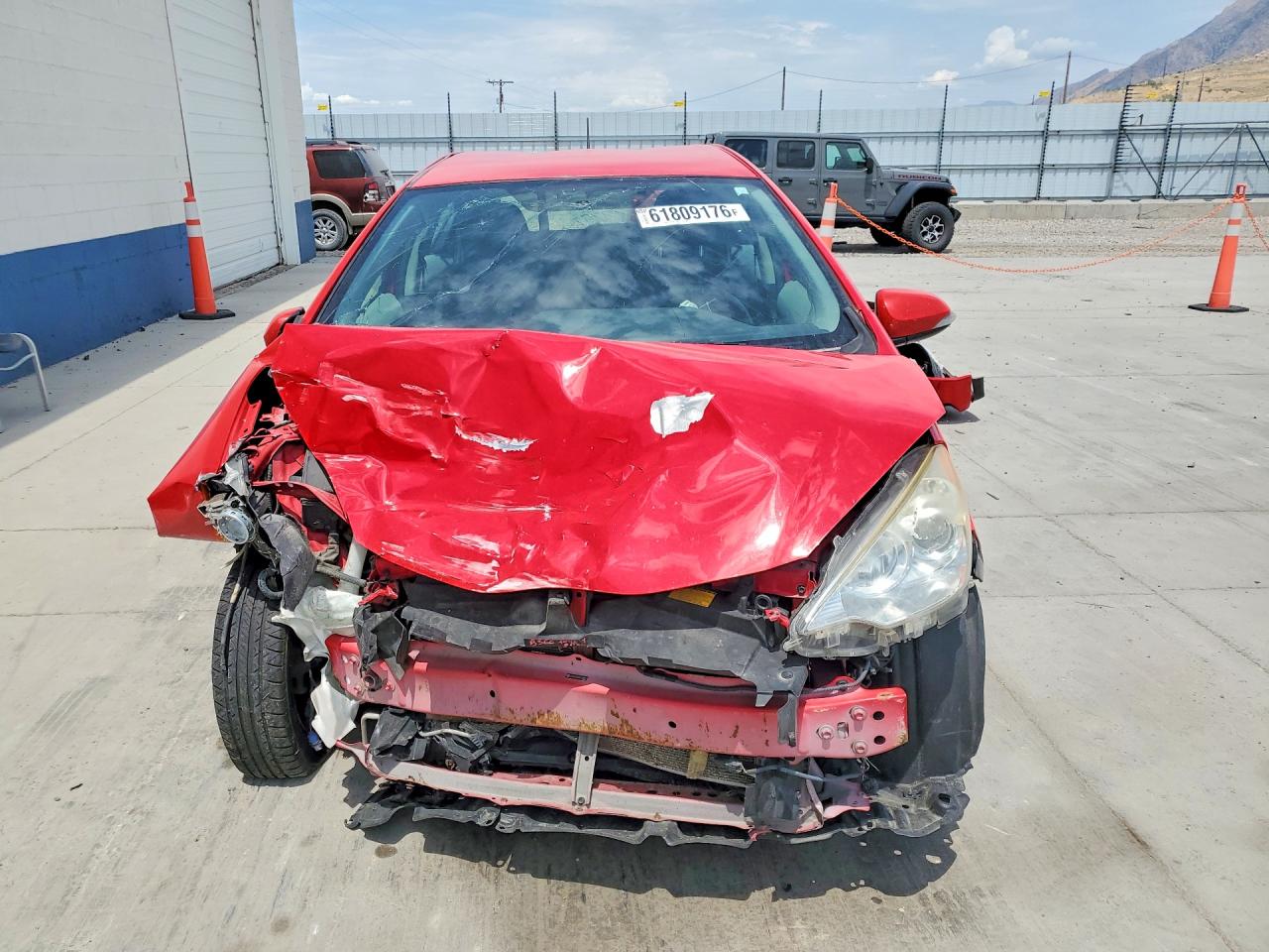 2013 Toyota Prius C Two Red vin: JTDKDTB35D1528557