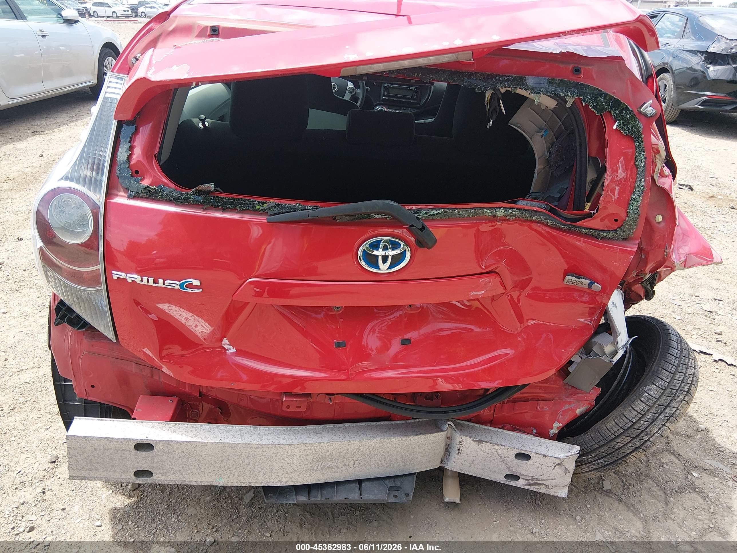 2014 Toyota Prius C One Red vin: JTDKDTB35E1571992
