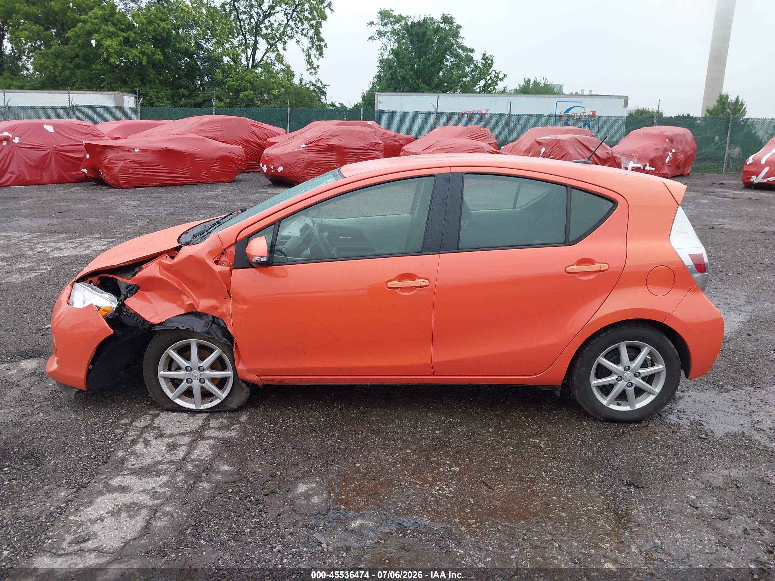 2012 Toyota Prius C Three Orange vin: JTDKDTB36C1010861