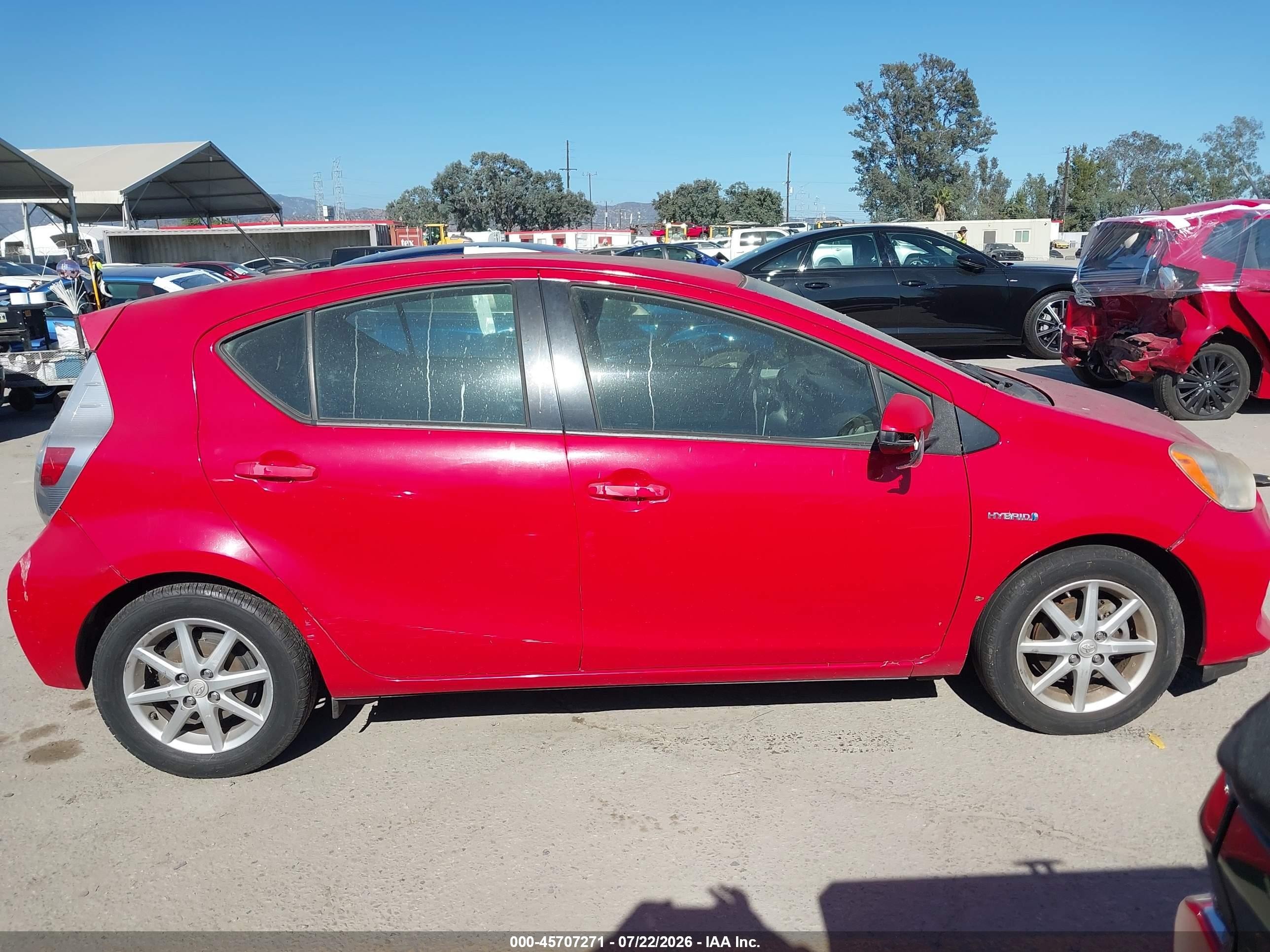 2013 Toyota Prius C Three Red vin: JTDKDTB36D1542001