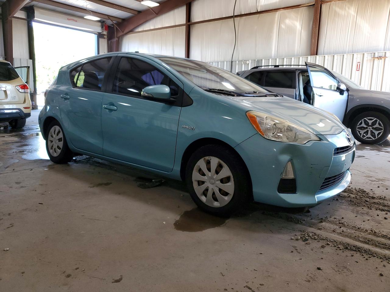 2014 Toyota Prius C Two Turquoise vin: JTDKDTB36E1069458