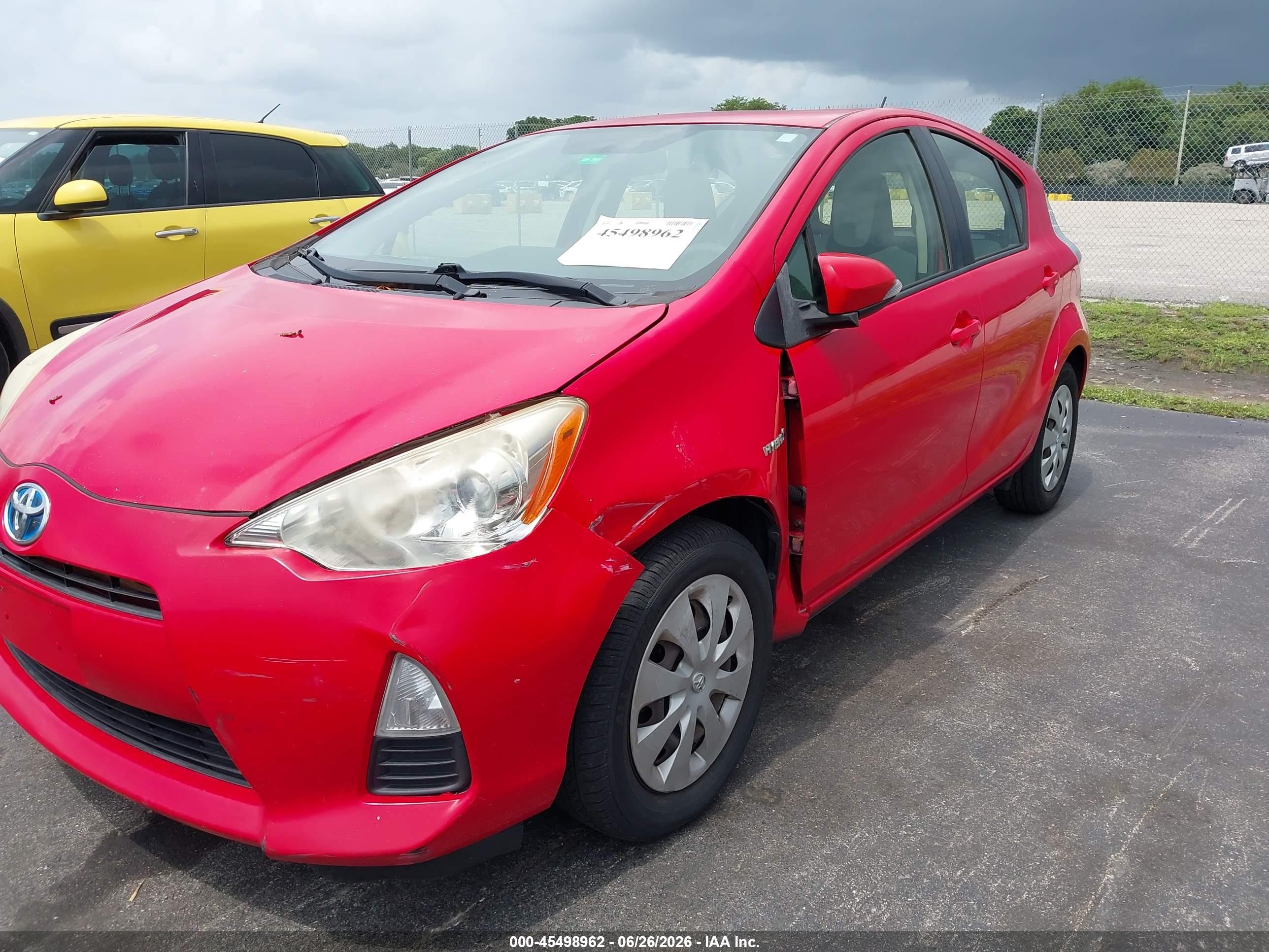 2014 Toyota Prius C One Red vin: JTDKDTB36E1083182