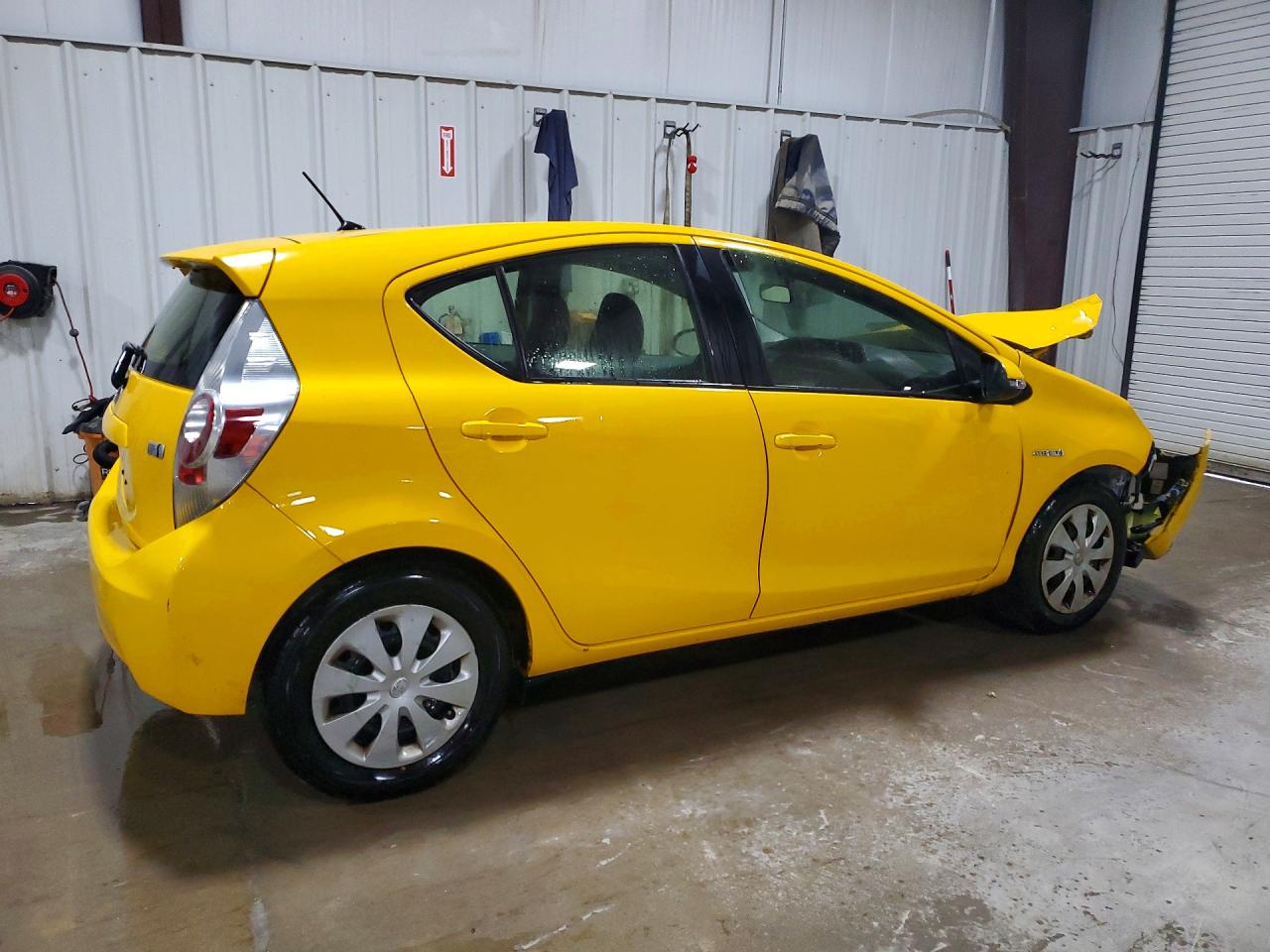 2014 Toyota Prius C Two Gold vin: JTDKDTB36E1083201