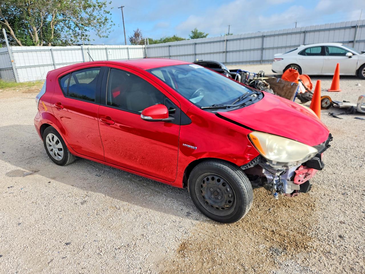 2012 Toyota Prius C Two Red vin: JTDKDTB37C1010643