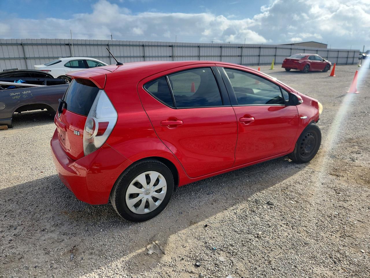 2012 Toyota Prius C Two Red vin: JTDKDTB37C1010643