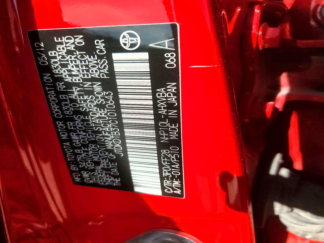 2012 Toyota Prius C Two Red vin: JTDKDTB37C1010643