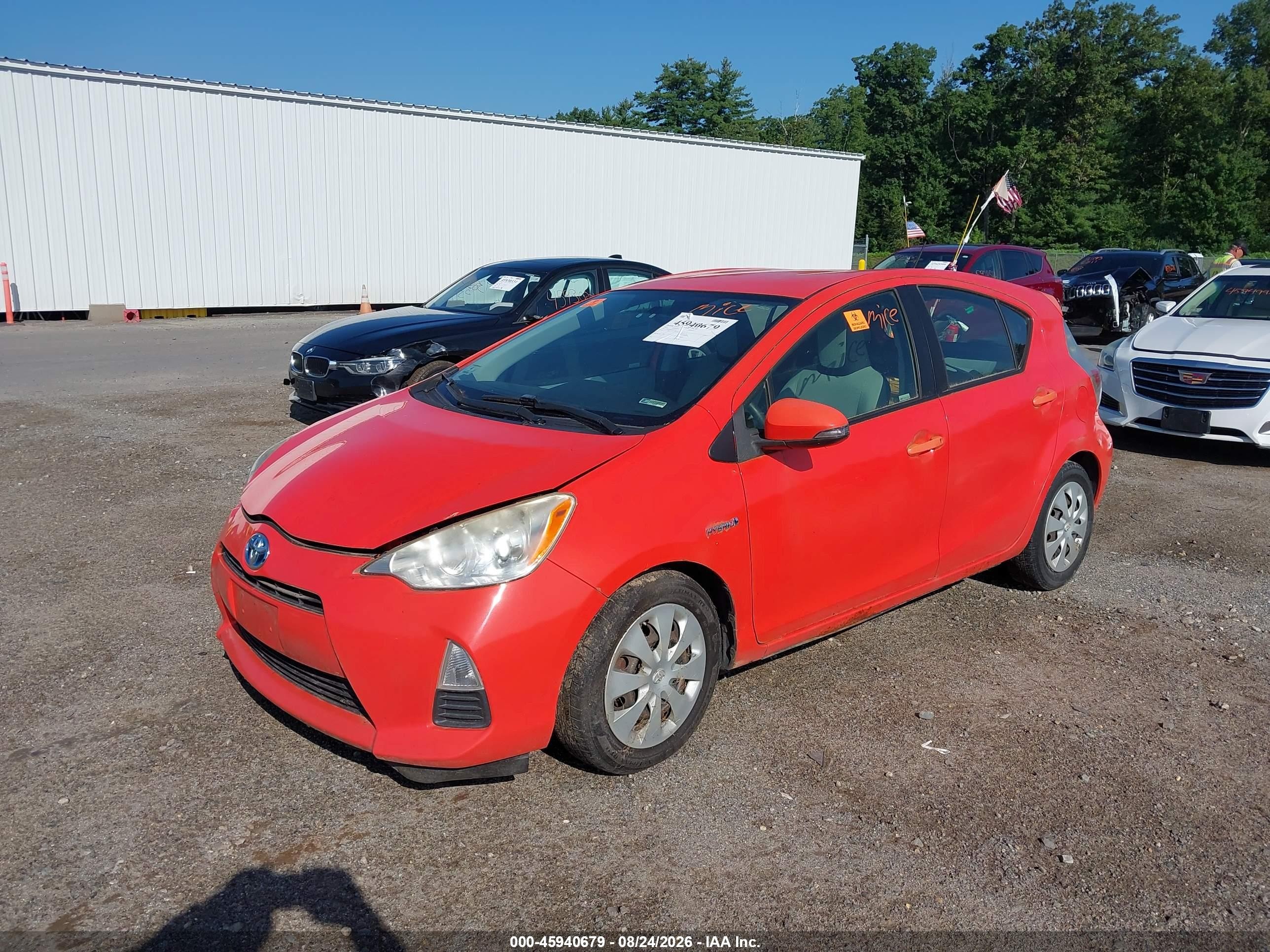 2012 Toyota Prius C One Orange vin: JTDKDTB37C1013901