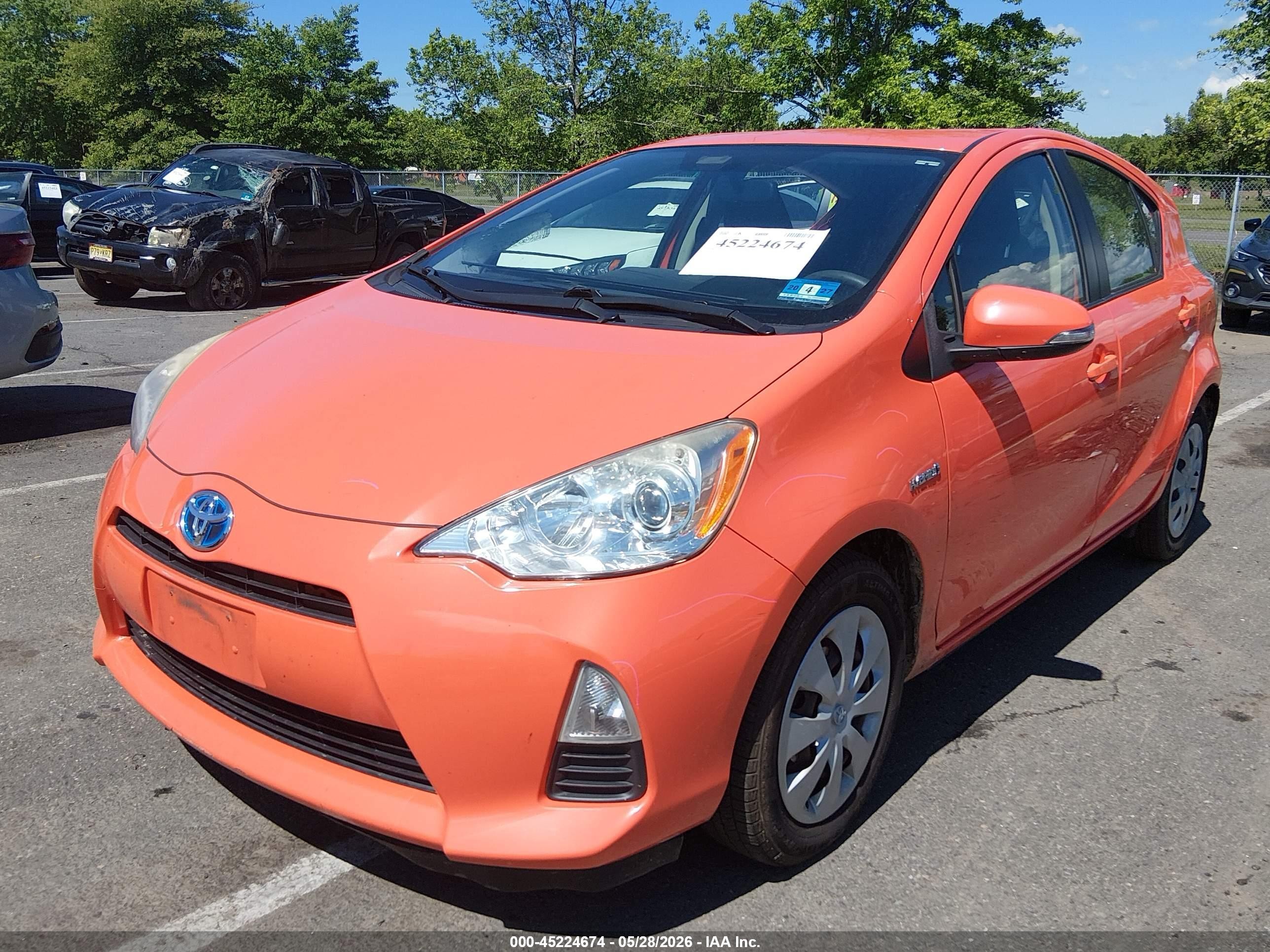 2014 Toyota Prius C Two Orange vin: JTDKDTB37E1059909