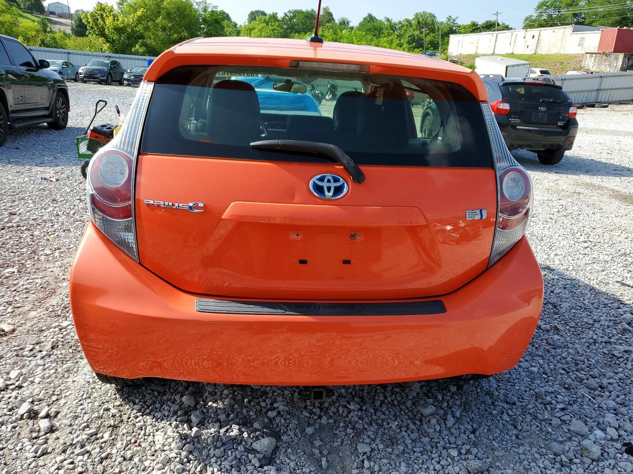 2014 Toyota Prius C Four Оранжевый vin: JTDKDTB39E1083645