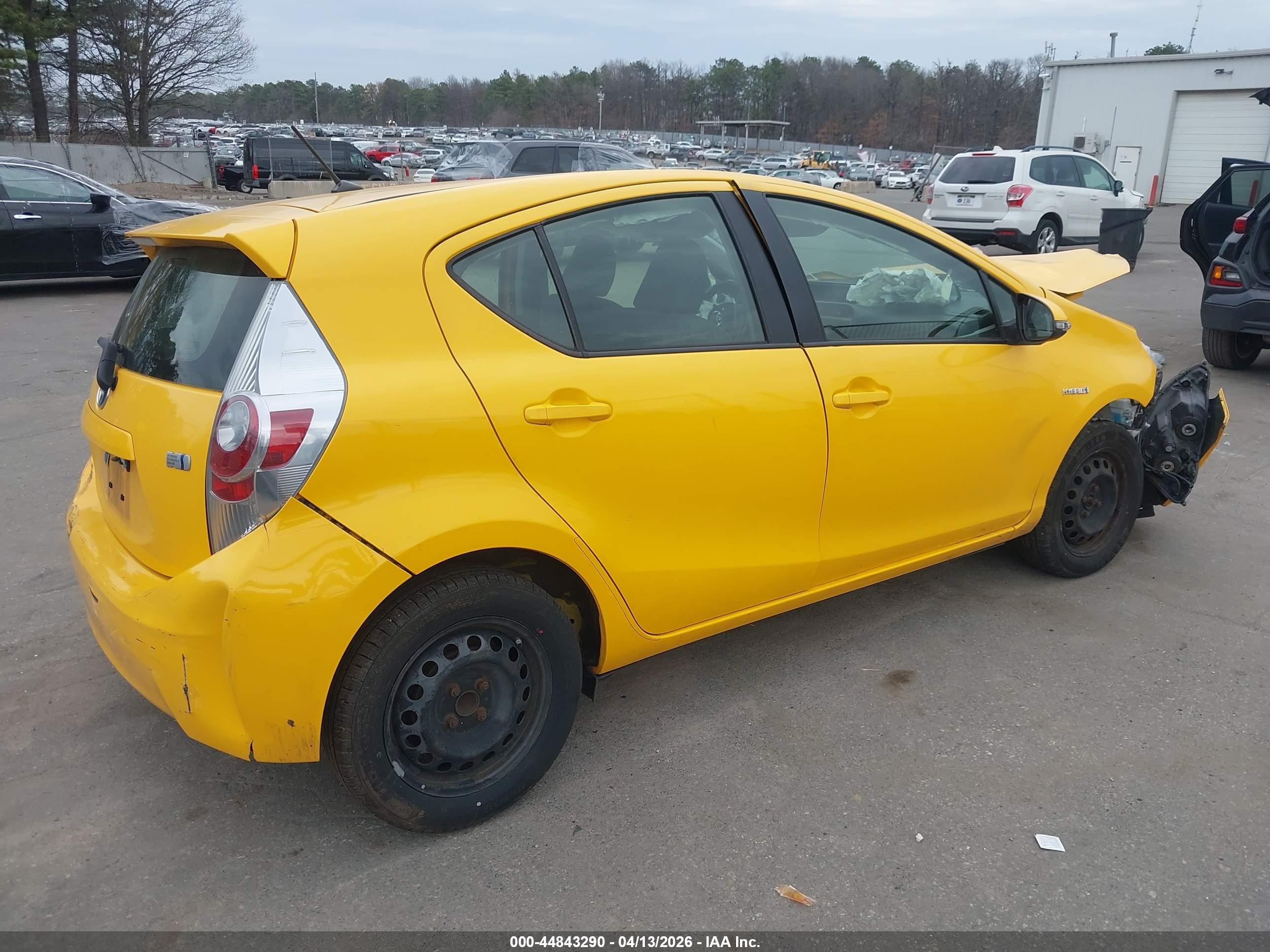2014 Toyota Prius C Two Yellow vin: JTDKDTB3XE1069267