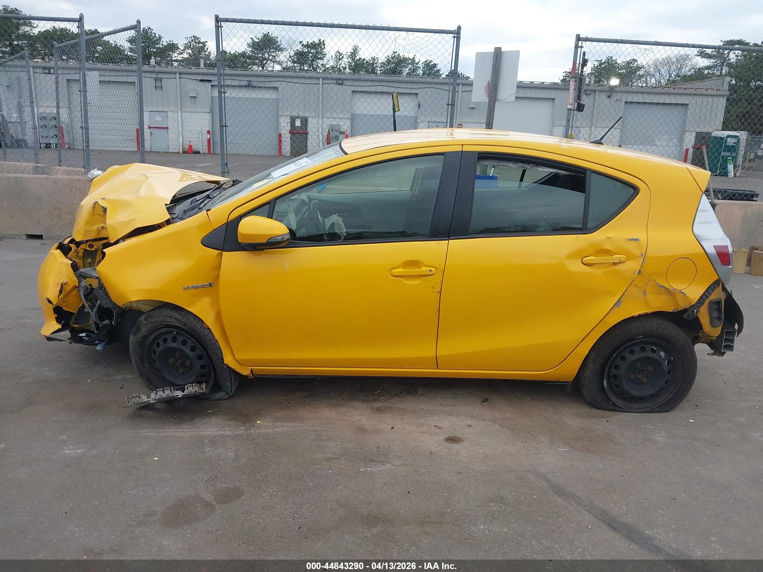 2014 Toyota Prius C Two Yellow vin: JTDKDTB3XE1069267