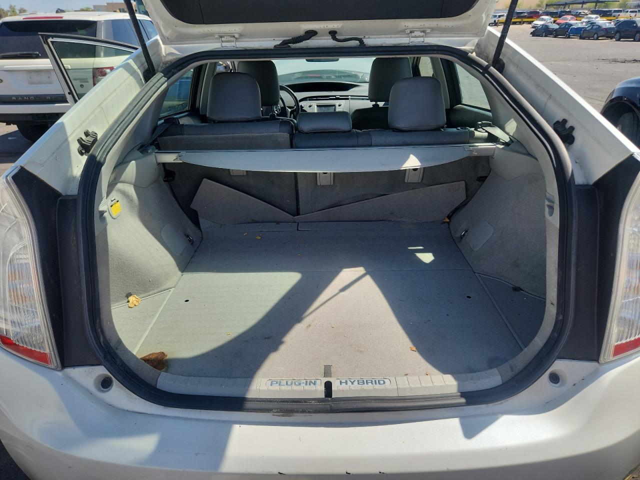 2012 Toyota Prius Plug-in Hybrid Base White vin: JTDKN3DP5C3028558 Damage: Trunk/Cargo Mat, Stained, Permanent