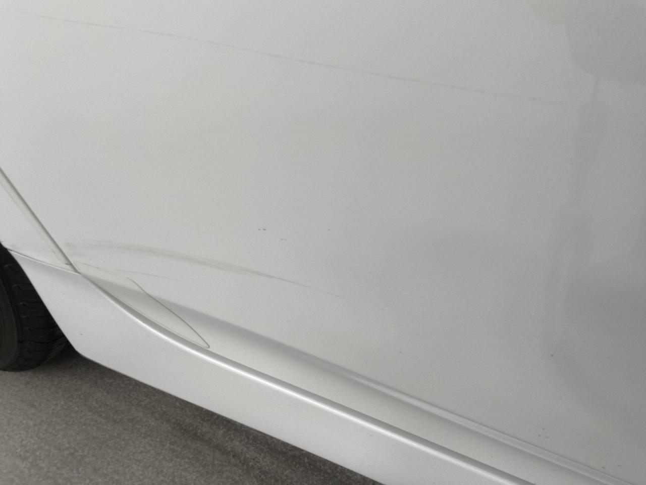 2014 Toyota Prius Three White vin: JTDKN3DU0E1742439 Damage: Right Rear Door, Light Scratch, 4 To 5 Inches