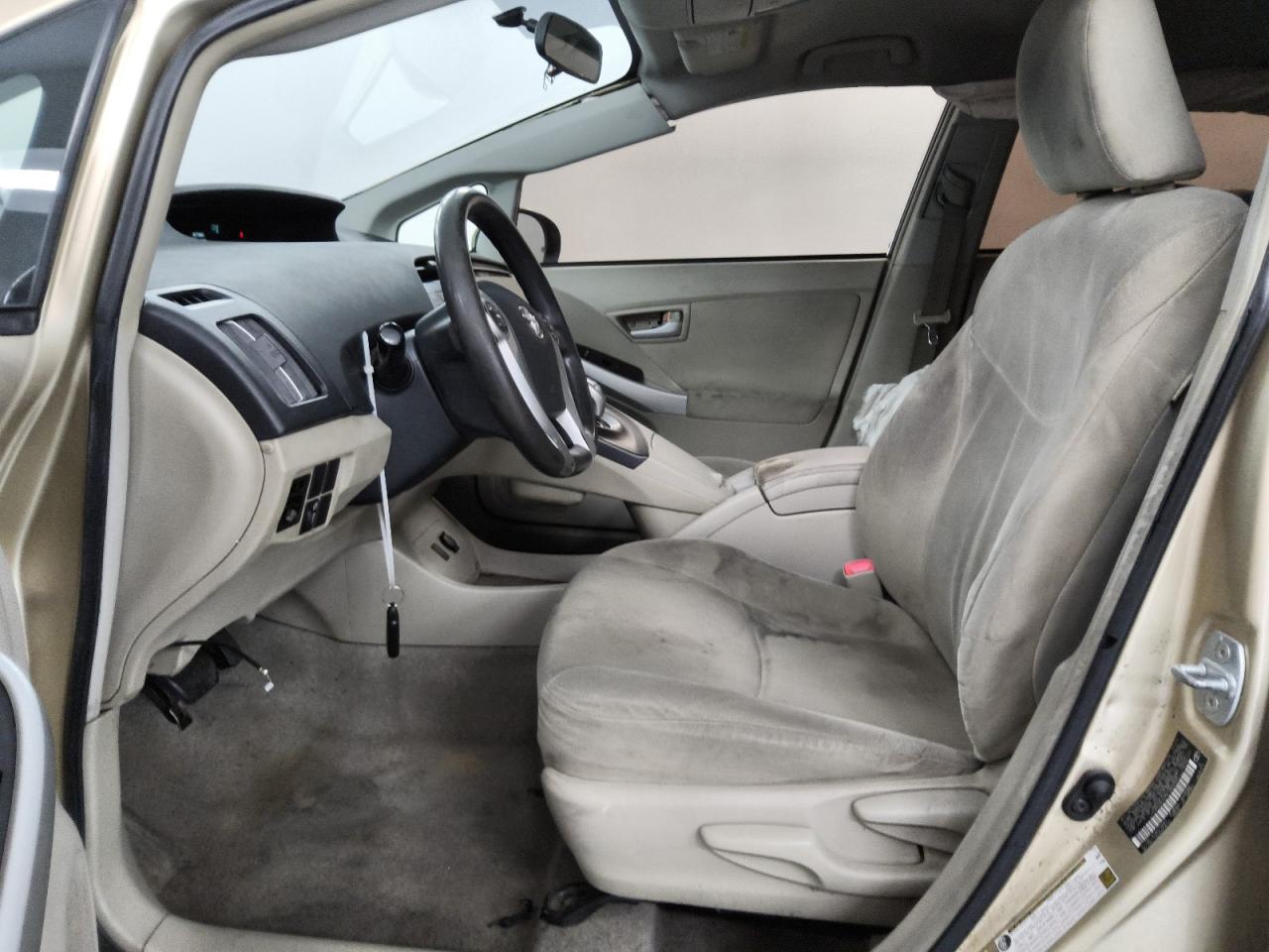 2011 Toyota Prius Two Tan vin: JTDKN3DU9B1463308 Damage: Left Front Seat, Stained, Permanent