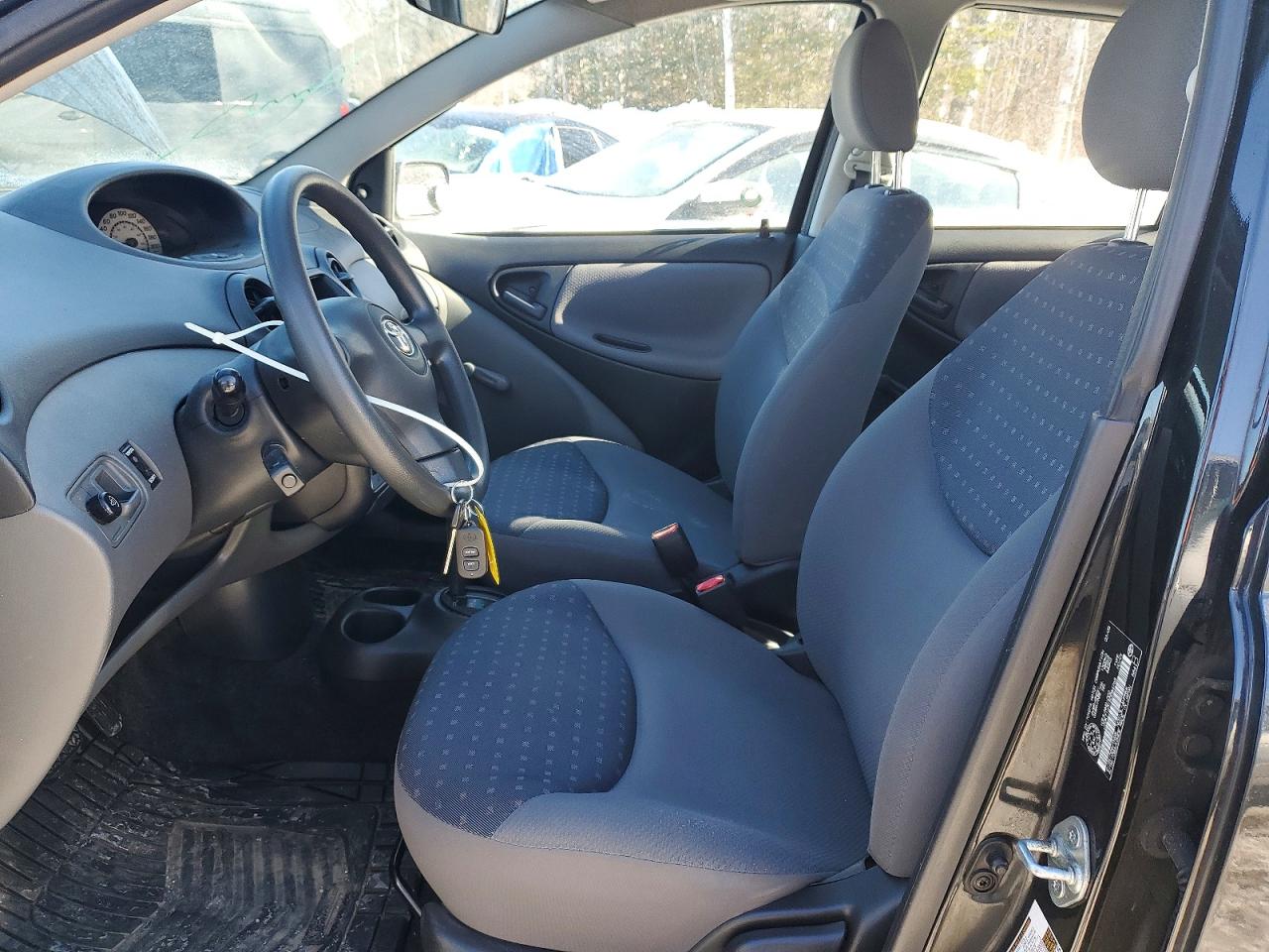 2005 Toyota Echo Черный vin: JTDKT123150084768