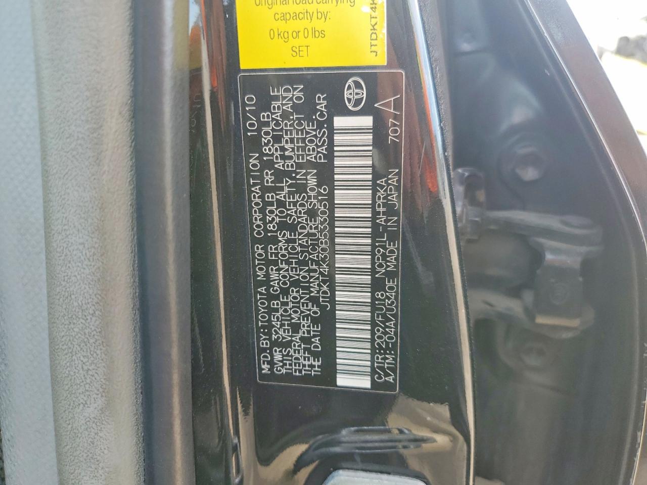 2011 Toyota Yaris Base Black vin: JTDKT4K30B5330516