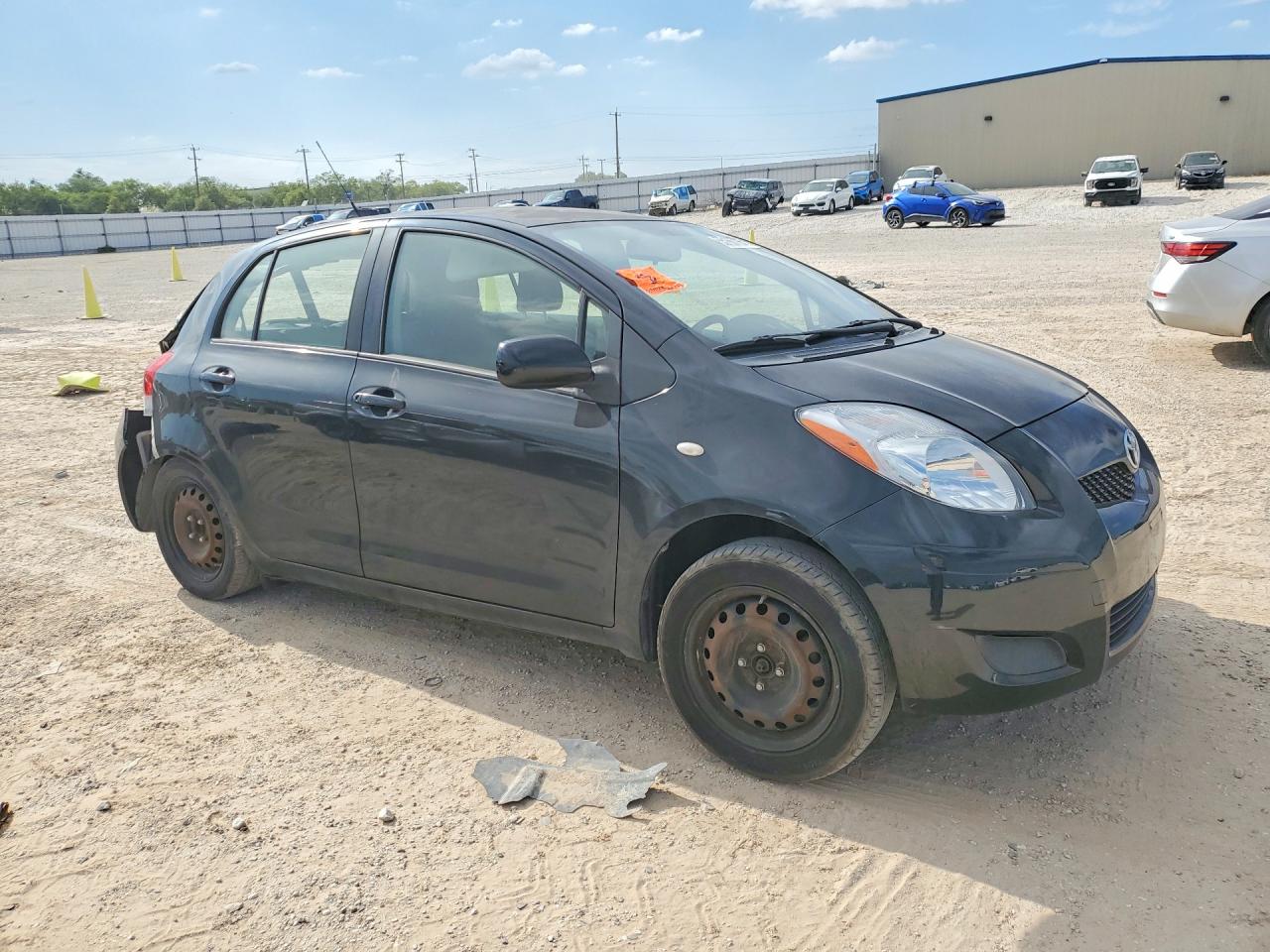 2011 Toyota Yaris Base Black vin: JTDKT4K30B5330516