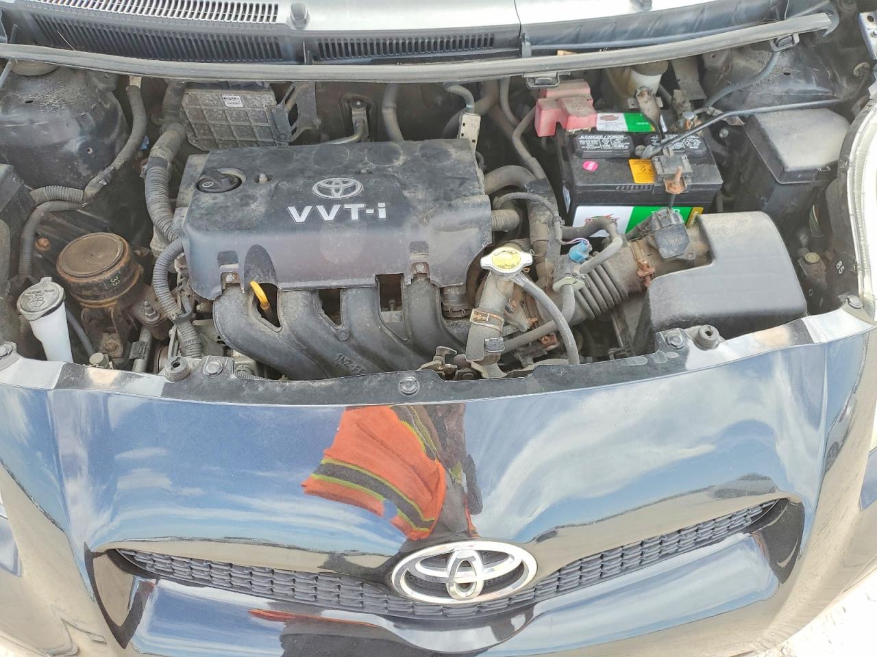 2011 Toyota Yaris Base Black vin: JTDKT4K30B5330516