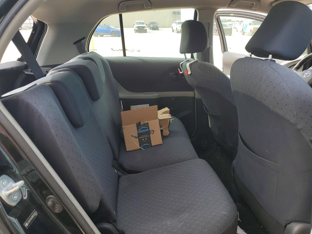 2011 Toyota Yaris Base Black vin: JTDKT4K30B5330516