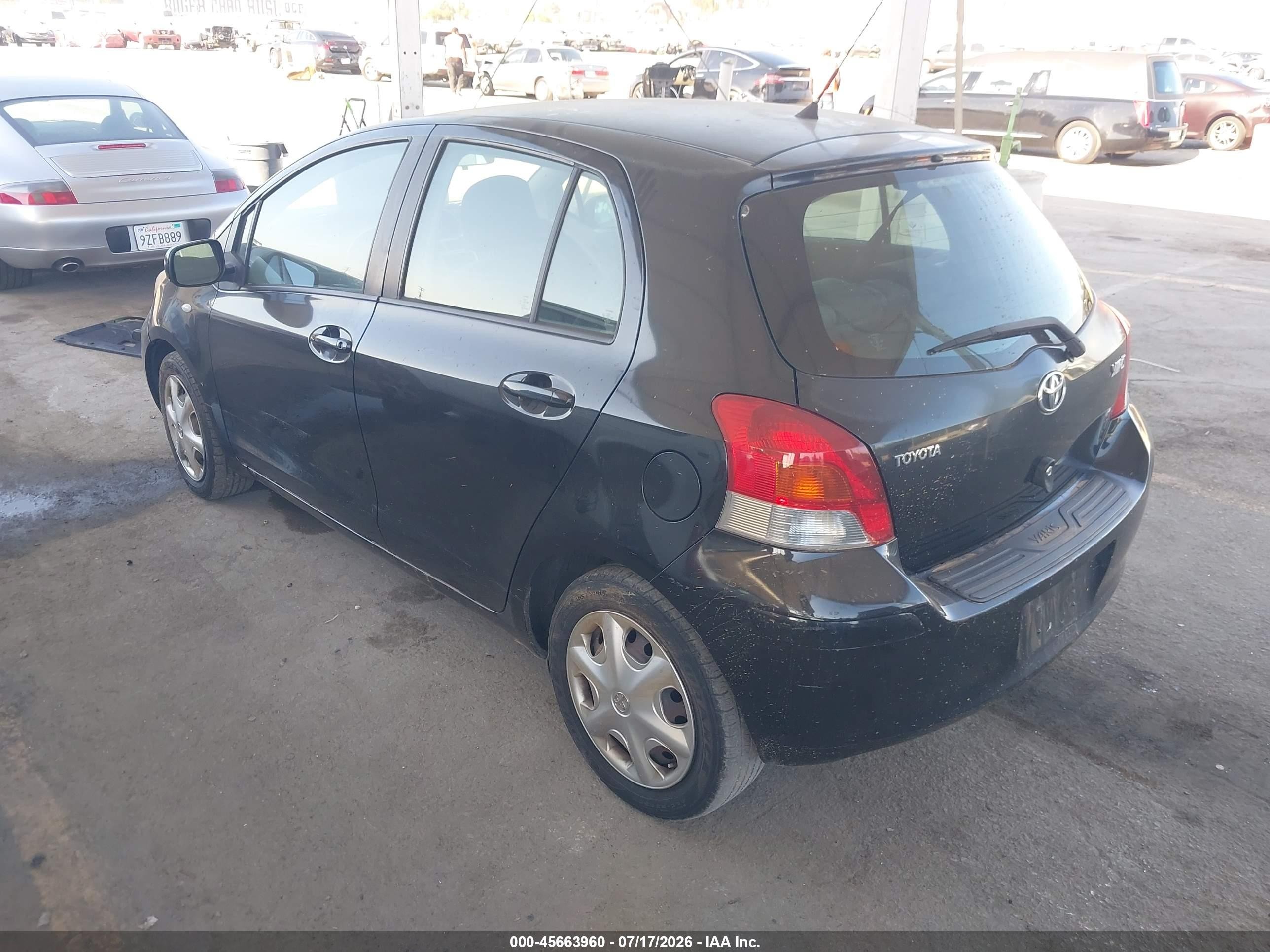 2010 Toyota Yaris Черный vin: JTDKT4K31A5320009