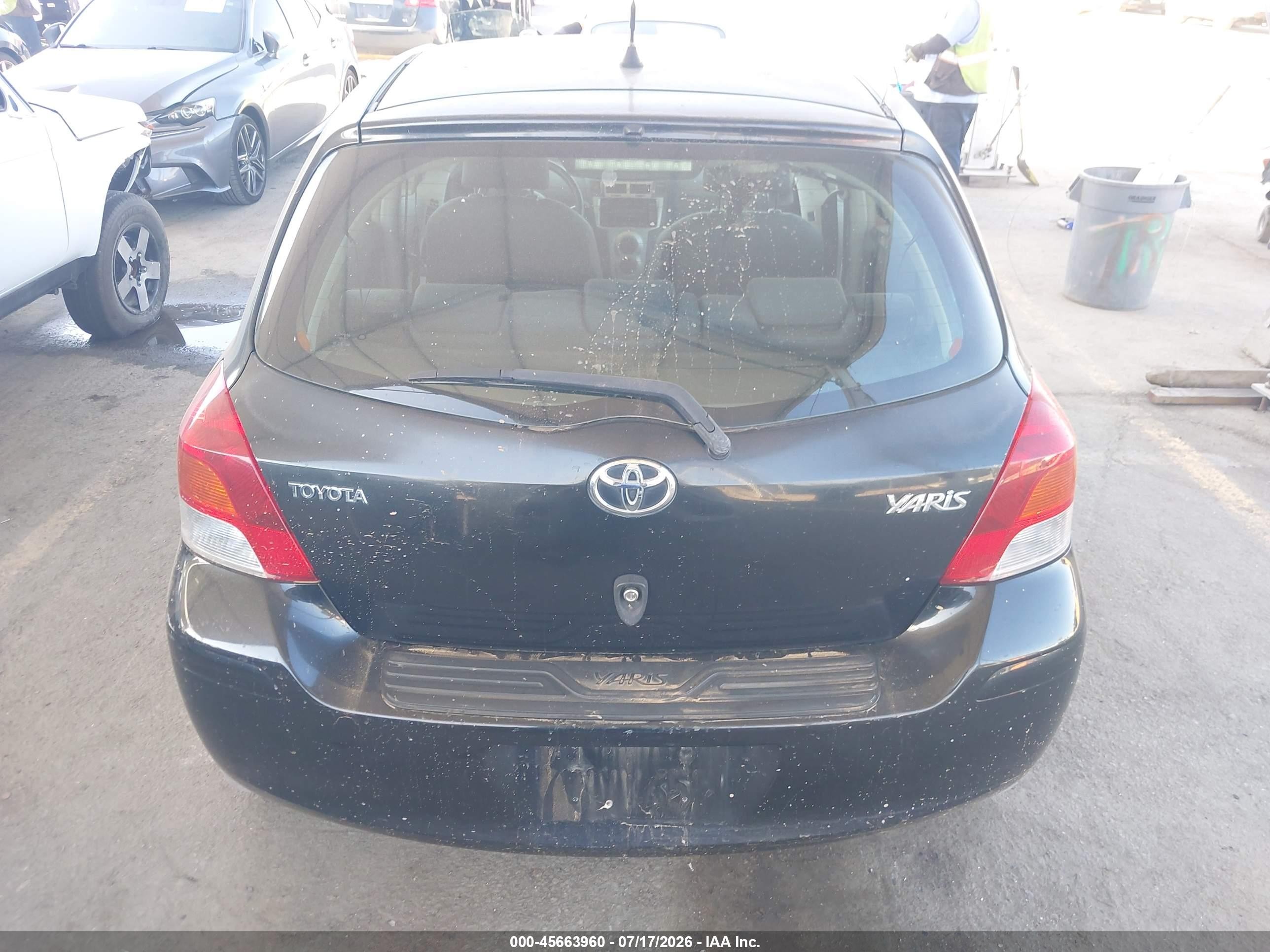 2010 Toyota Yaris Черный vin: JTDKT4K31A5320009