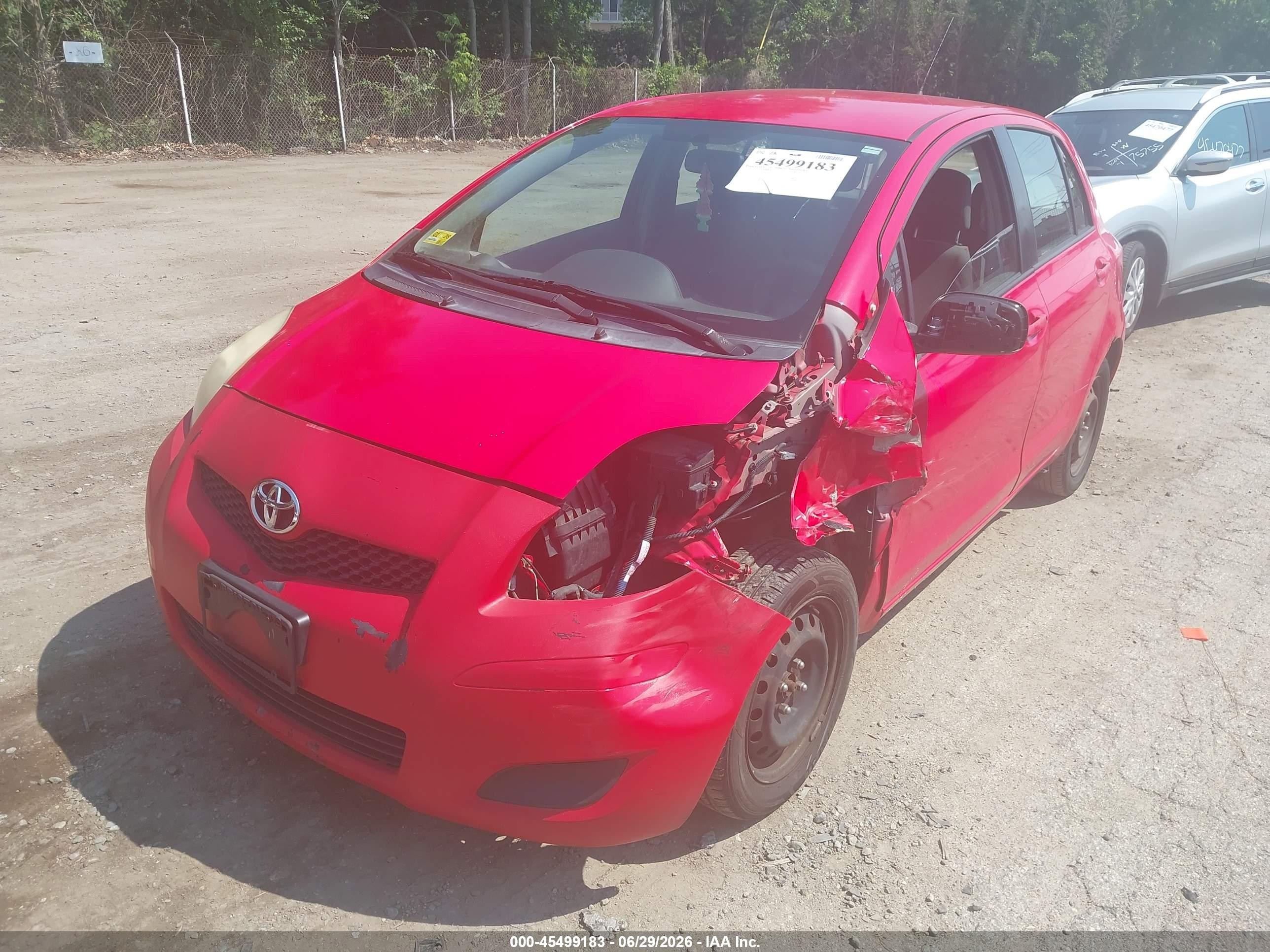 2010 Toyota Yaris Maroon vin: JTDKT4K32A5288347