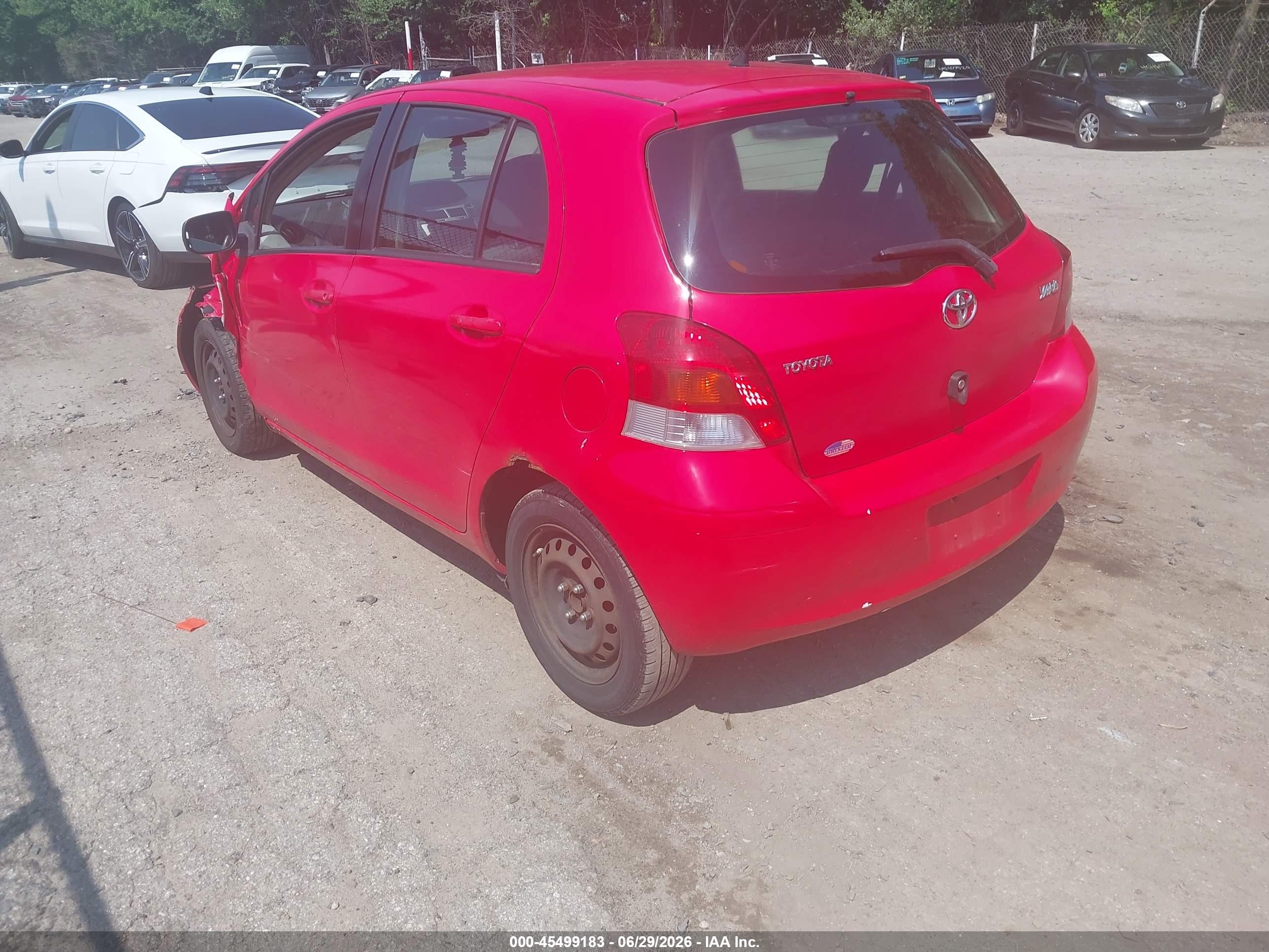 2010 Toyota Yaris Maroon vin: JTDKT4K32A5288347