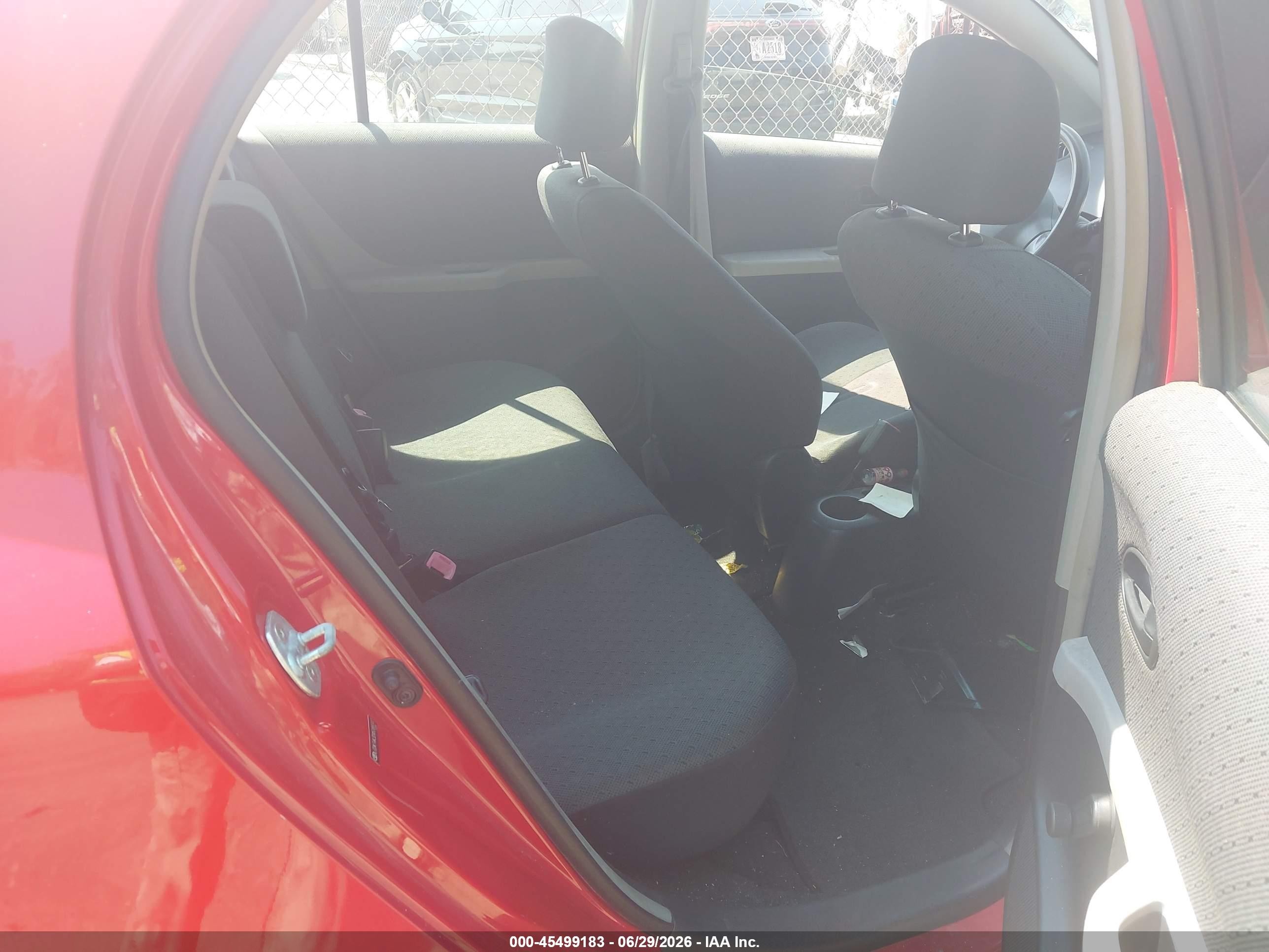 2010 Toyota Yaris Maroon vin: JTDKT4K32A5288347