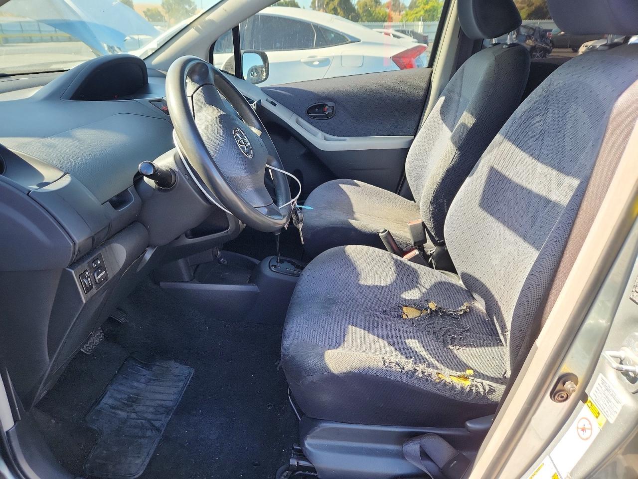 2010 Toyota Yaris Base Gray vin: JTDKT4K32A5315840