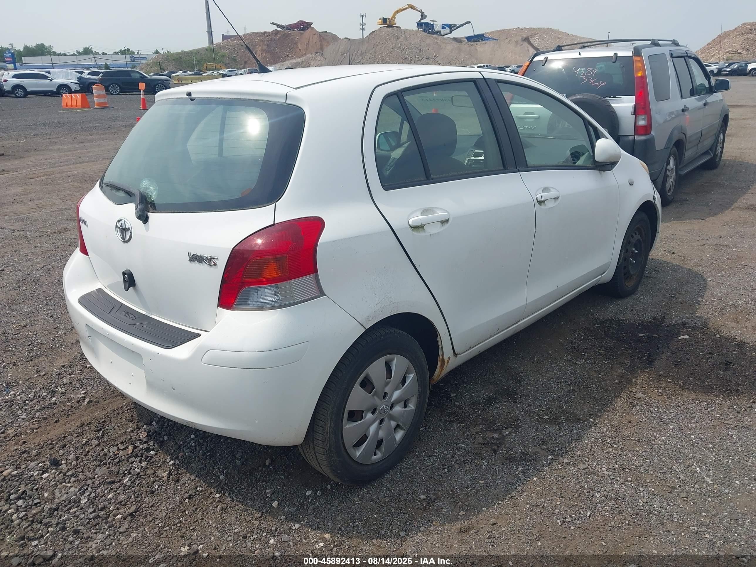 2010 Toyota Yaris   White vin: JTDKT4K33A5282900