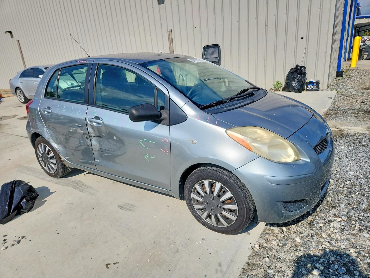 2010 Toyota Yaris Base Gray vin: JTDKT4K37A5289025
