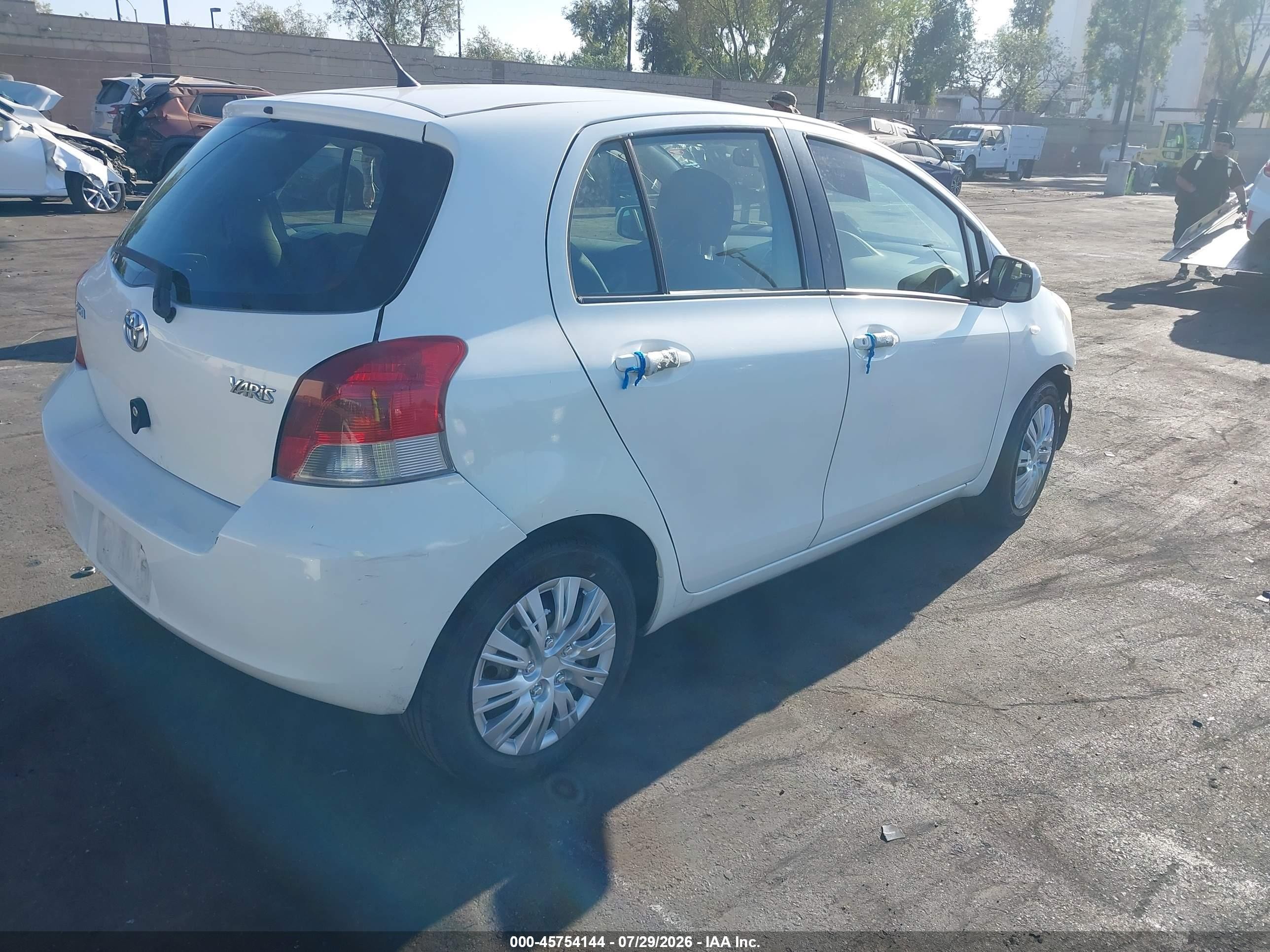 2010 Toyota Yaris   White vin: JTDKT4K37A5321973