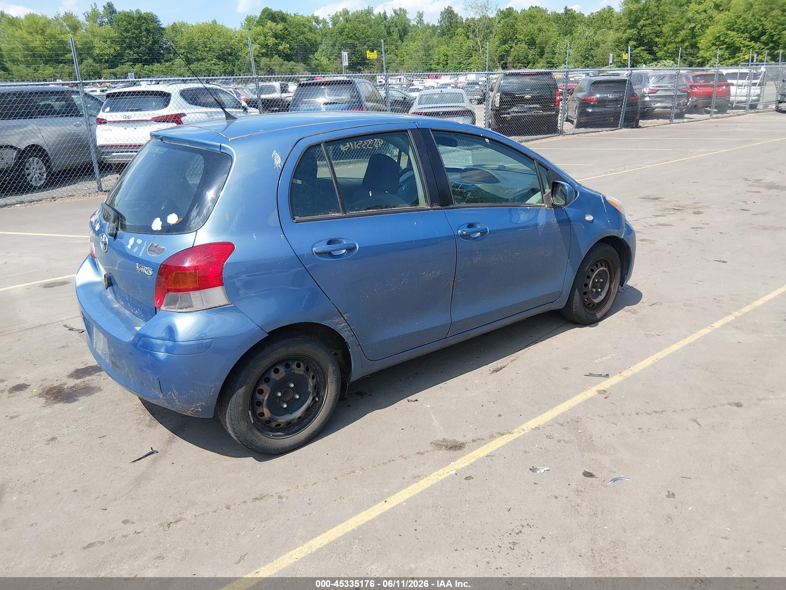 2009 Toyota Yaris   Синий vin: JTDKT903095232192