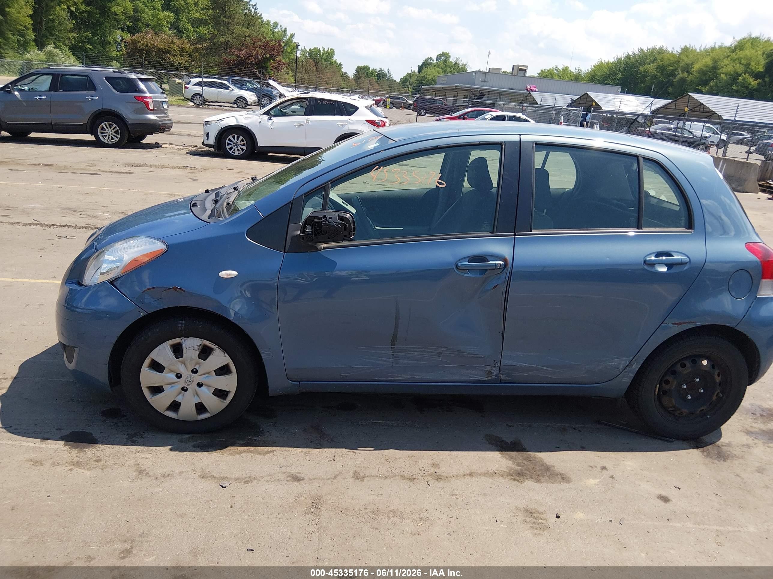 2009 Toyota Yaris   Синий vin: JTDKT903095232192