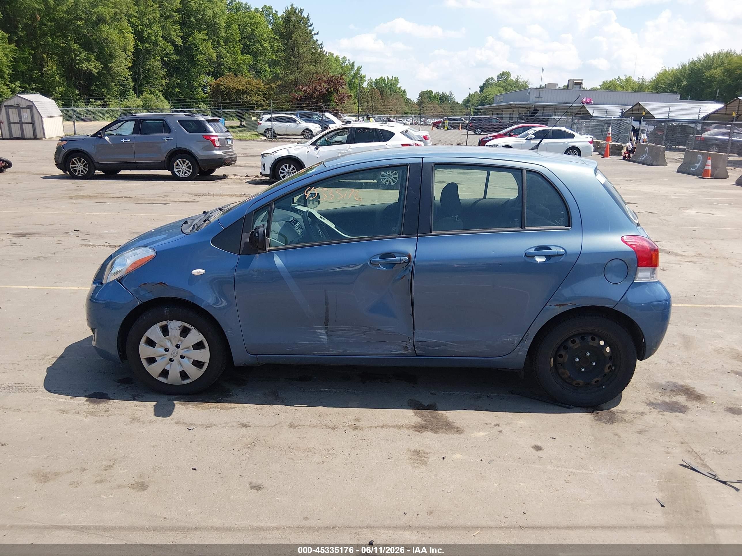 2009 Toyota Yaris   Синий vin: JTDKT903095232192