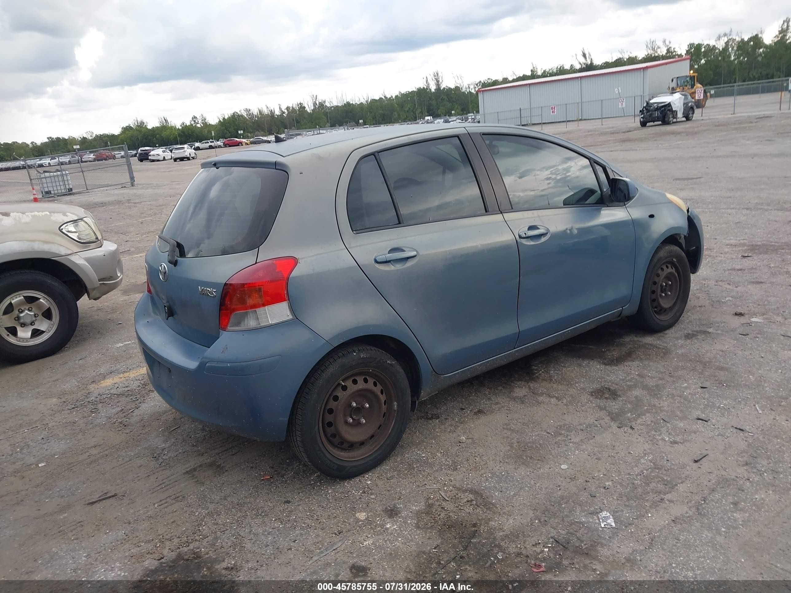 2009 Toyota Yaris   Navy vin: JTDKT903095257139
