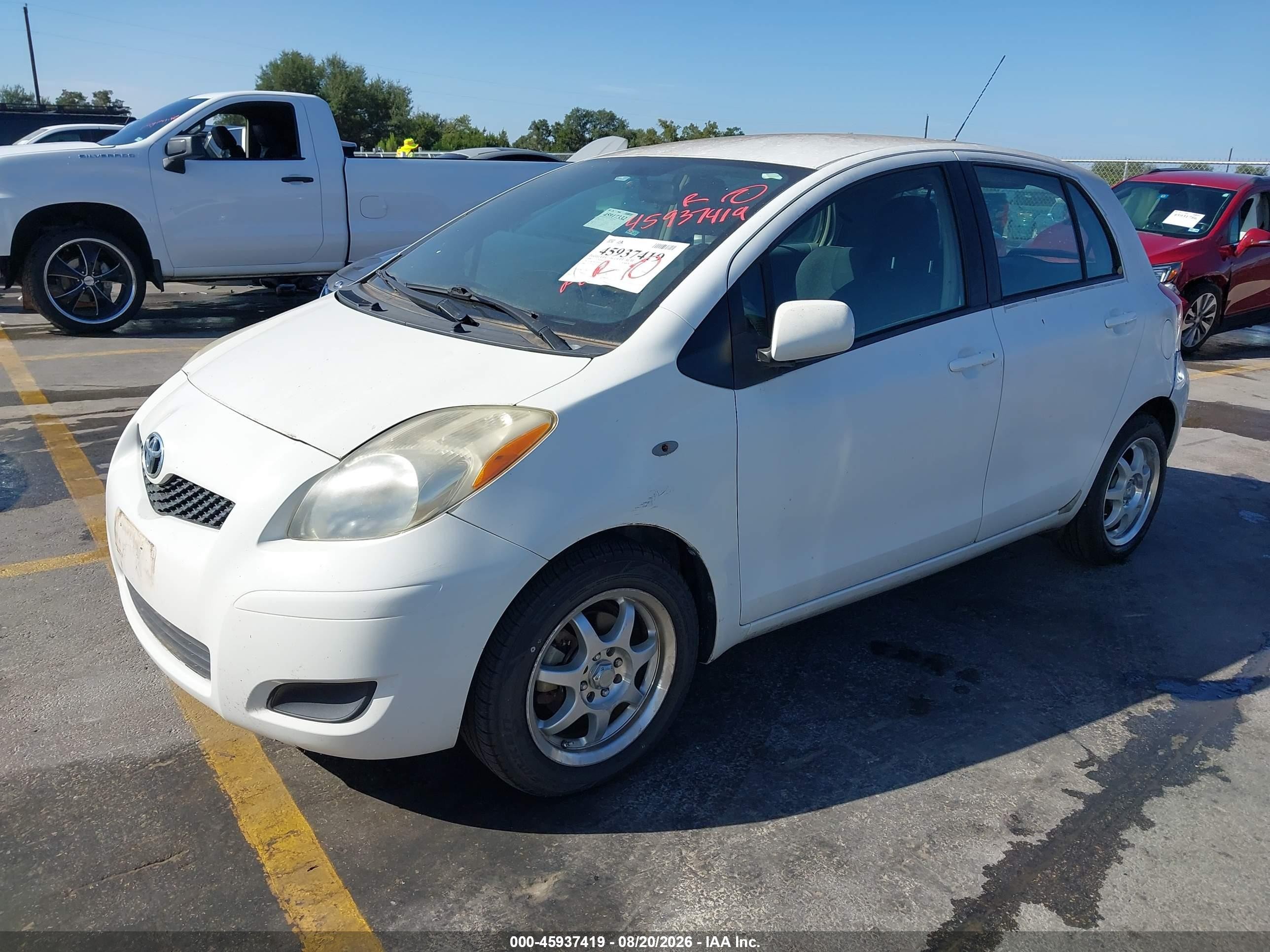 2009 Toyota Yaris   White vin: JTDKT903195245632