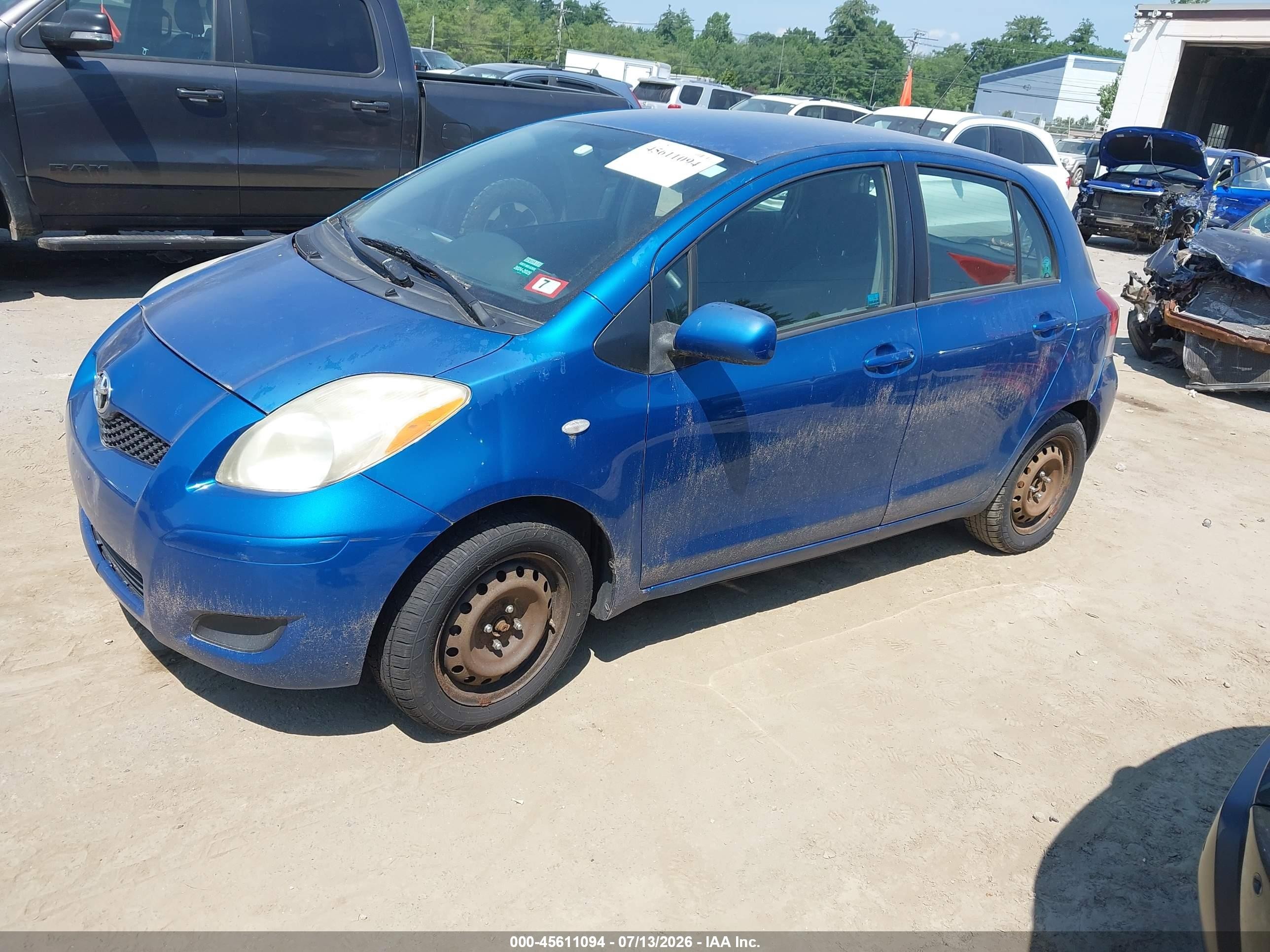 2009 Toyota Yaris   Синий vin: JTDKT903695245741