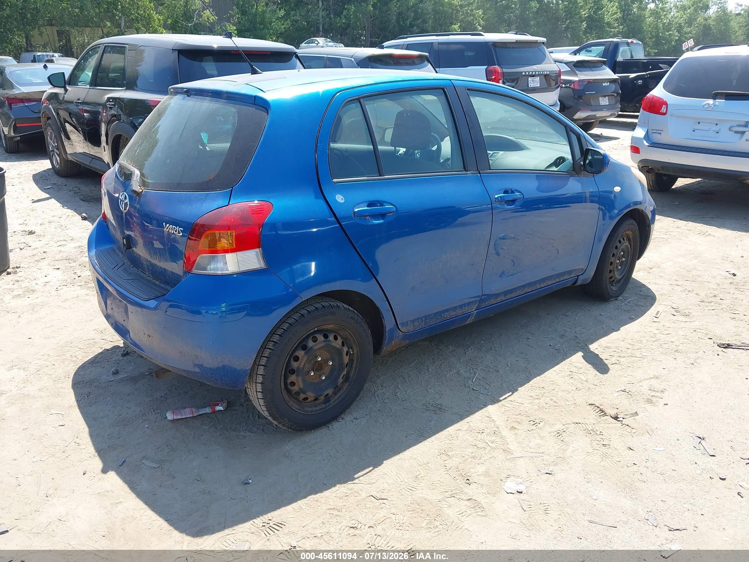 2009 Toyota Yaris   Синий vin: JTDKT903695245741