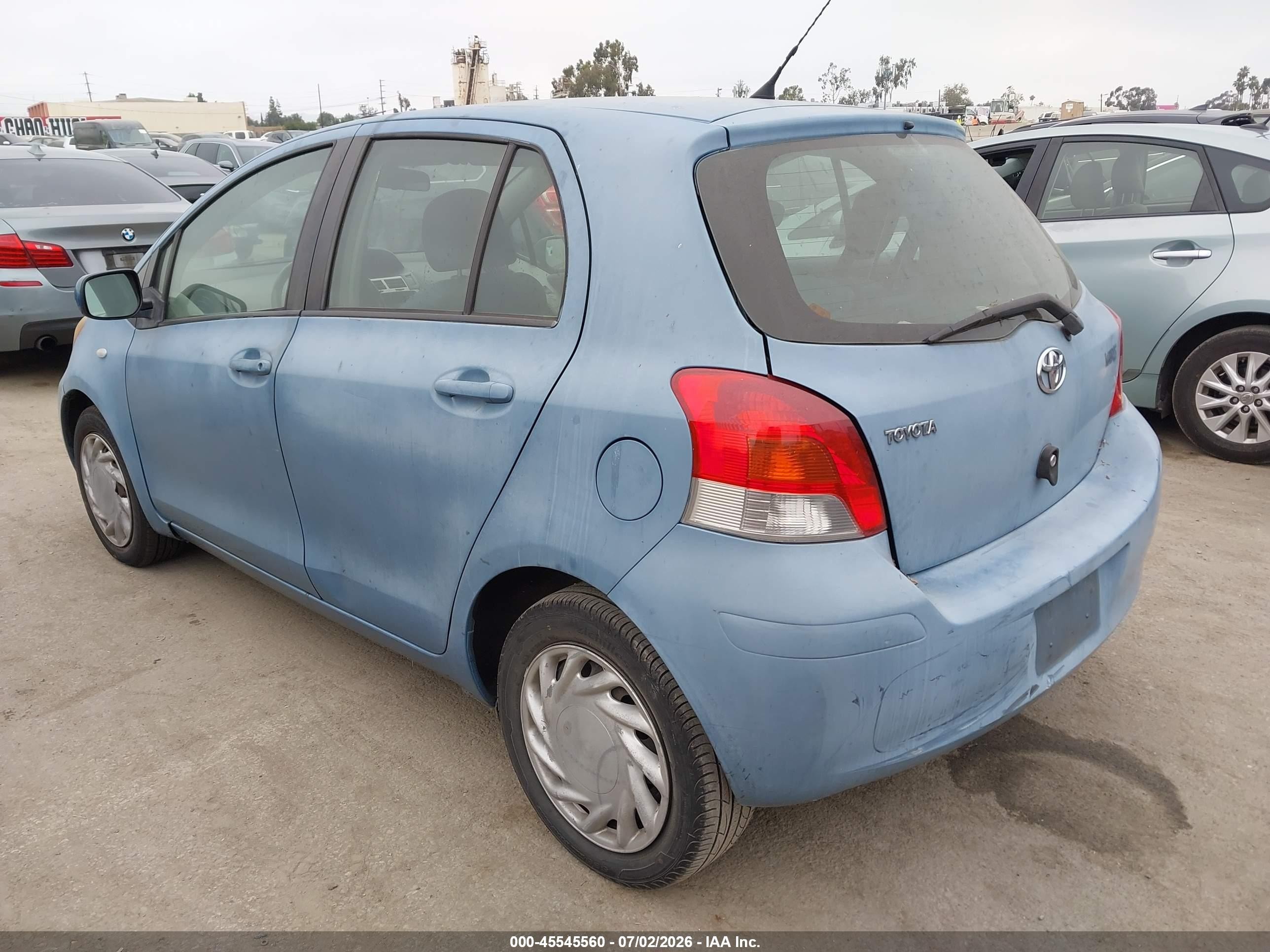 2009 Toyota Yaris   Синий vin: JTDKT903895256062