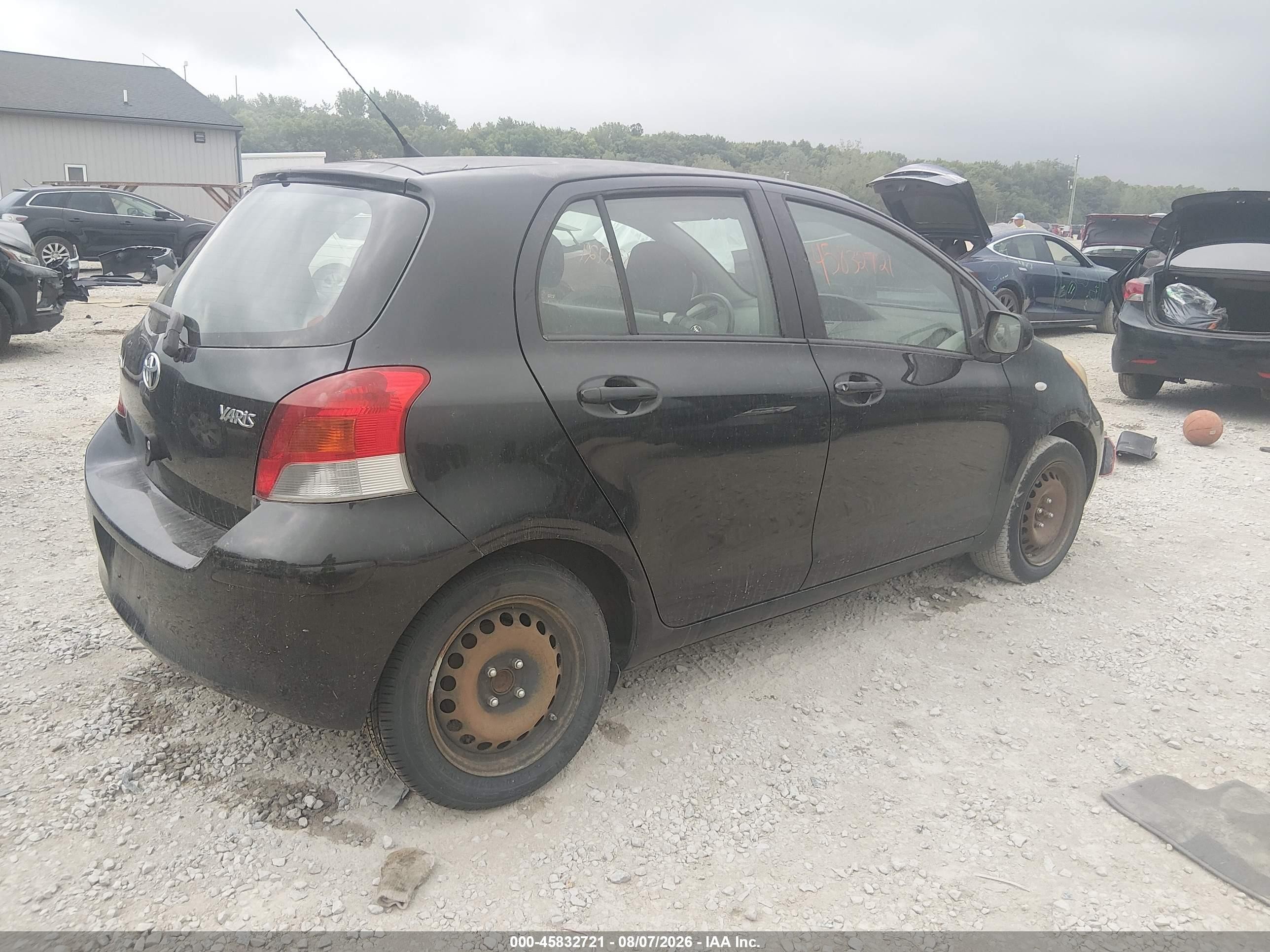 2009 Toyota Yaris Black vin: JTDKT903995230294