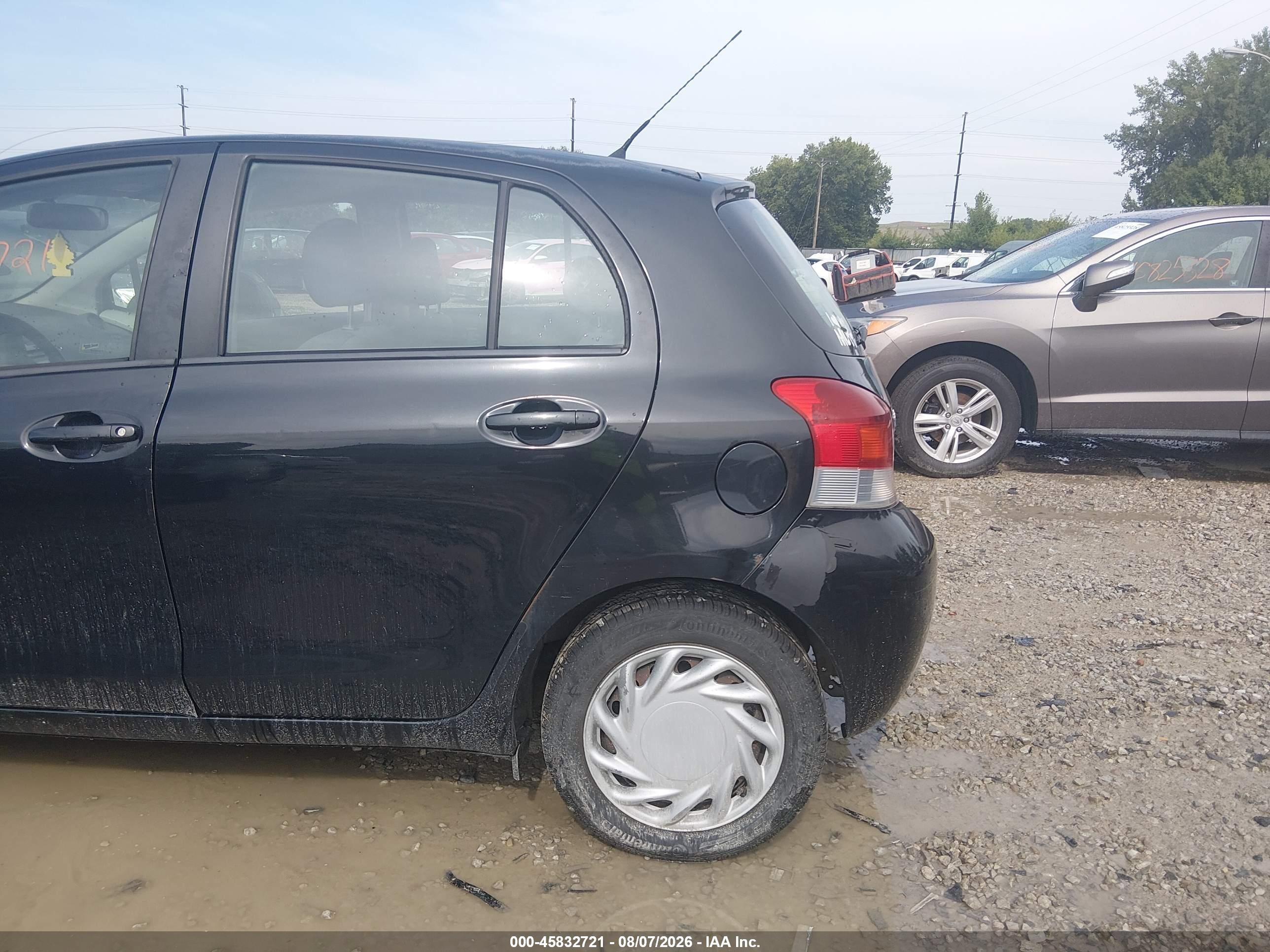 2009 Toyota Yaris Black vin: JTDKT903995230294