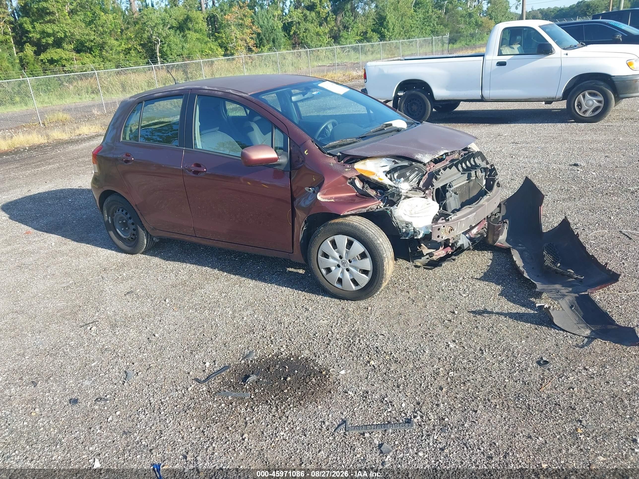 2009 Toyota Yaris   Burgundy vin: JTDKT903X95242602