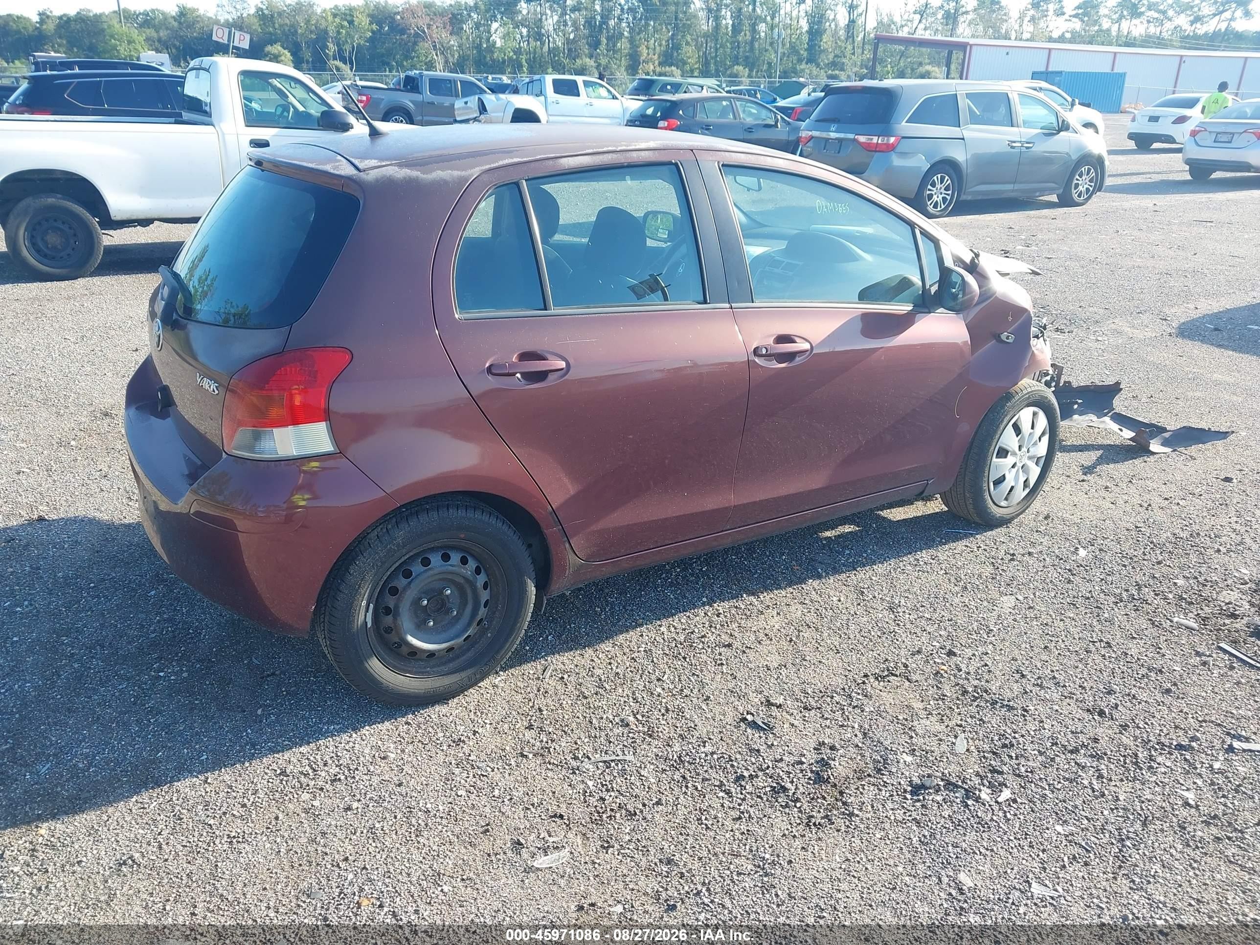 2009 Toyota Yaris   Burgundy vin: JTDKT903X95242602