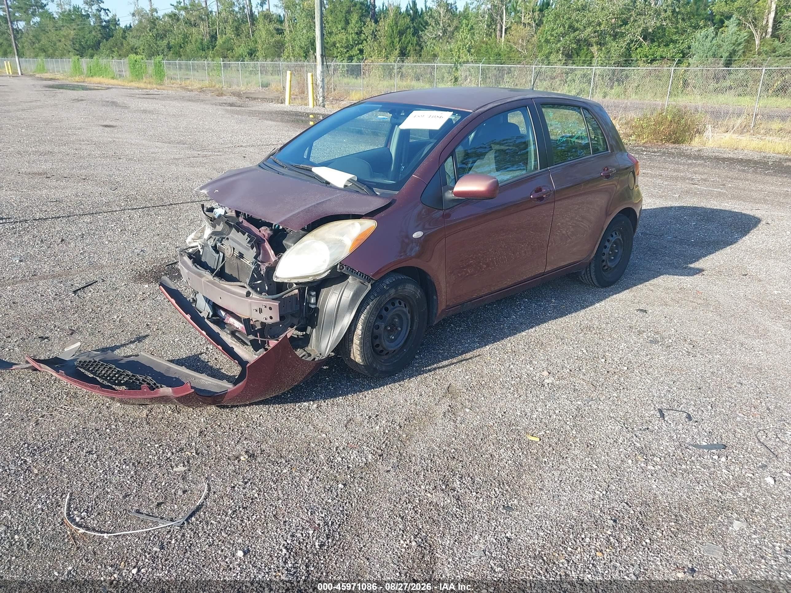 2009 Toyota Yaris   Burgundy vin: JTDKT903X95242602